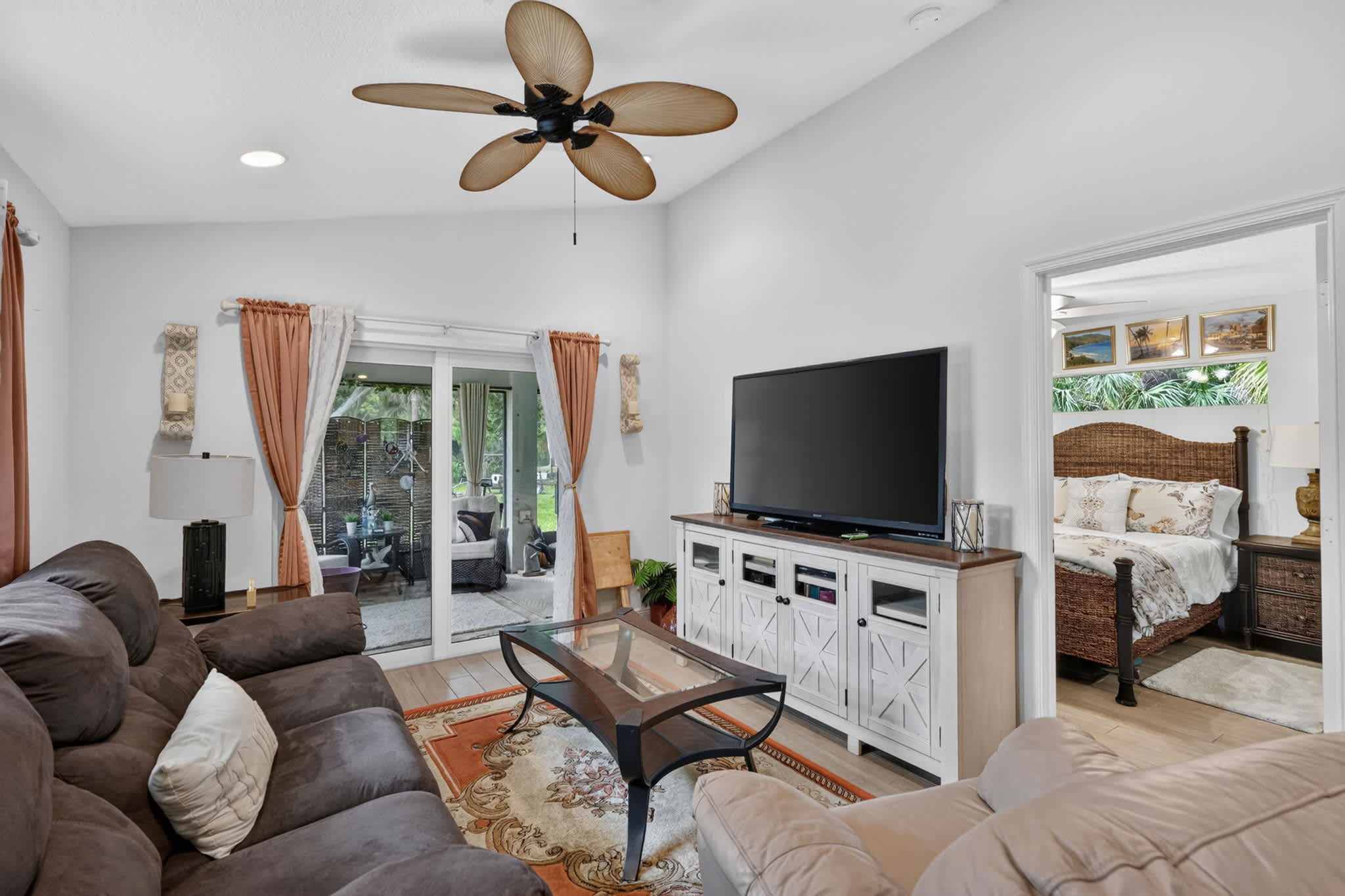 Curl up in the breezy living room & stream your favorites on the smart TV​