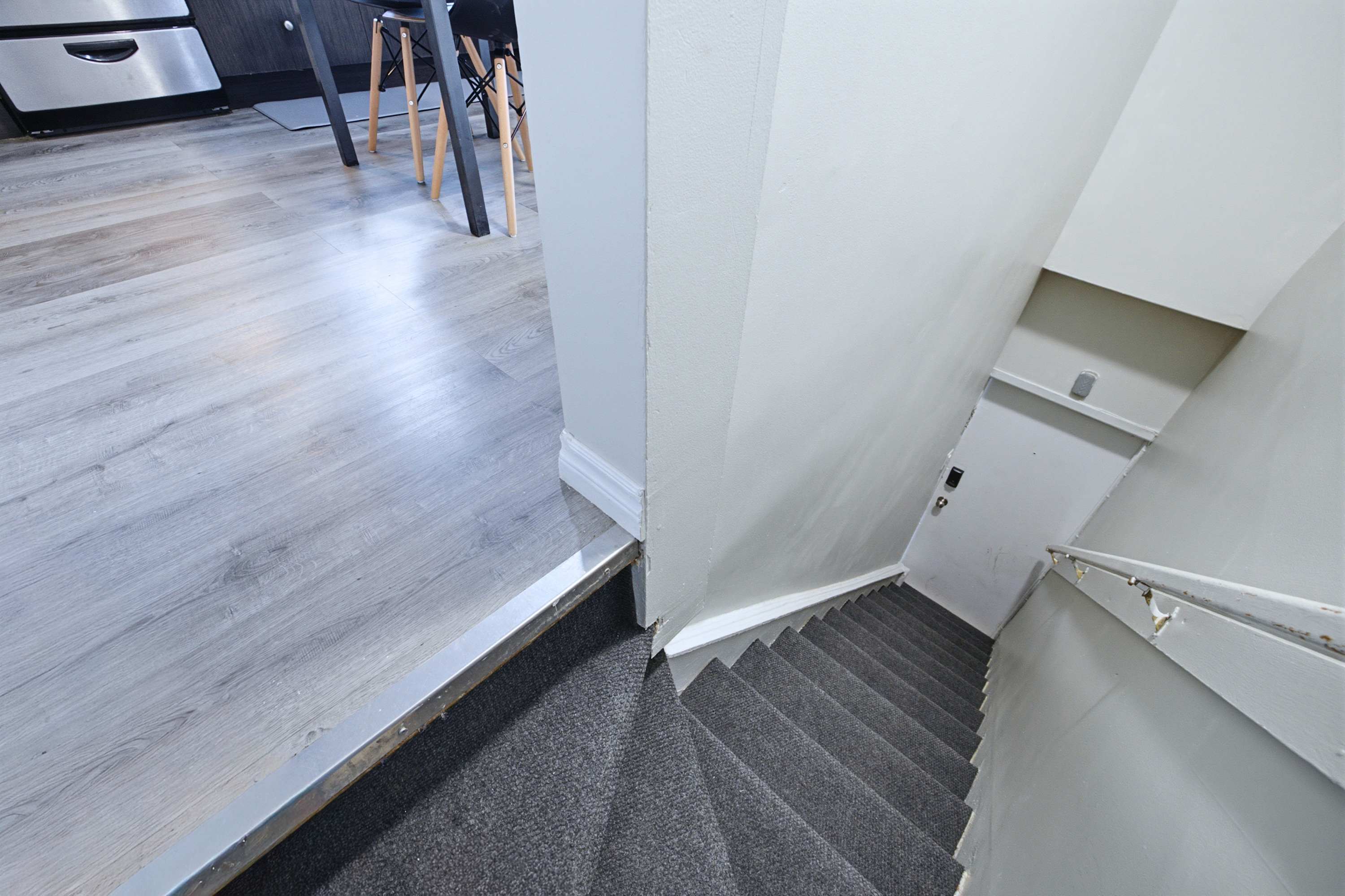 Welcome home through the private stairway entry to the unit