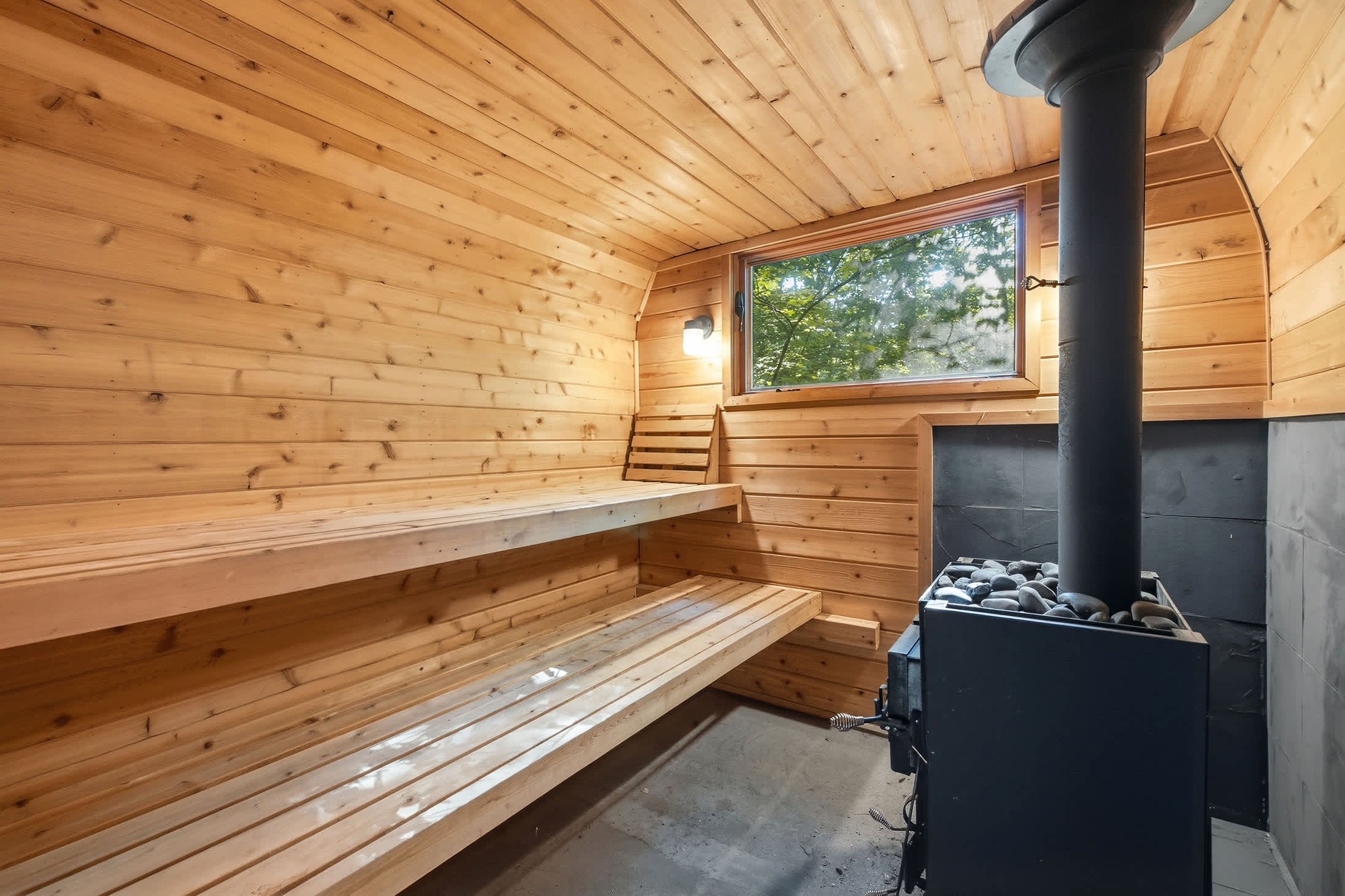 Your private cedar sauna quiet, calming, and wonderfully indulgent.