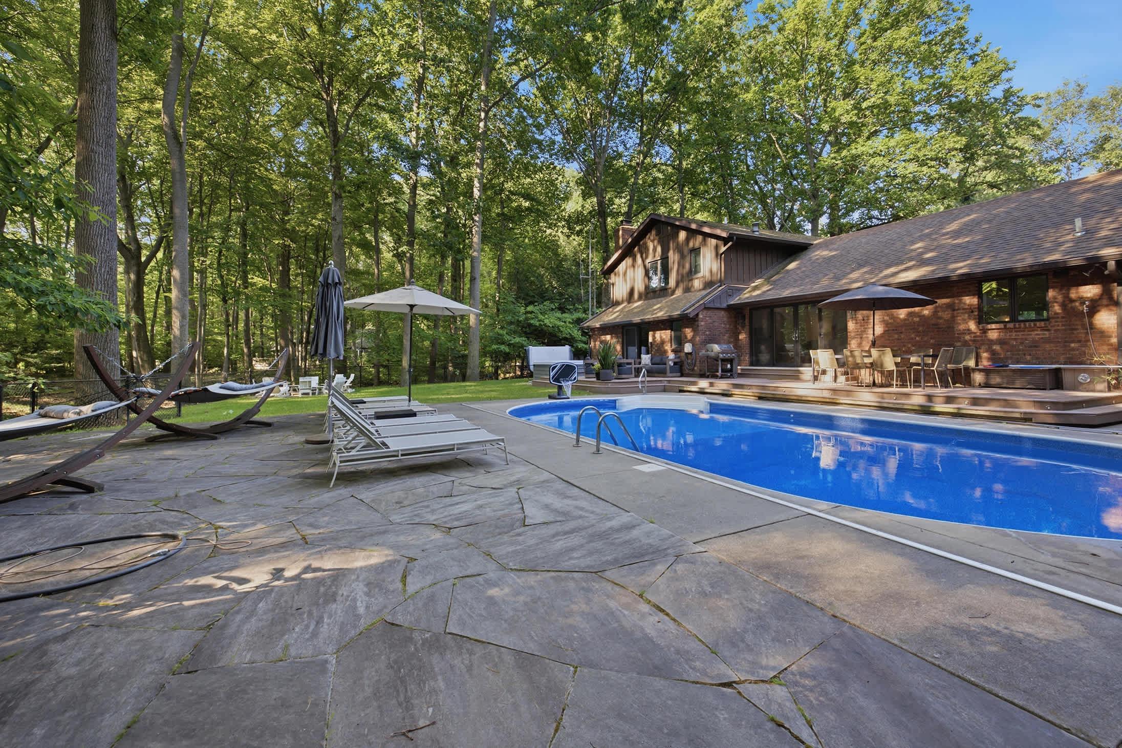 Dive in, stretch out, and enjoy the privacy of the forest-framed pool.