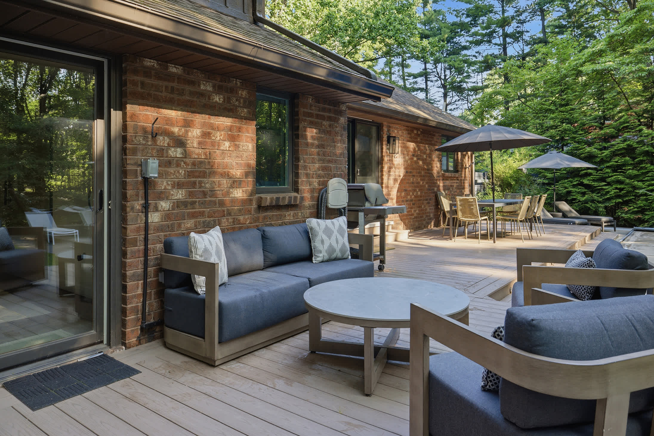 Gather outdoors with comfortable seating just steps from the pool and hot tub.