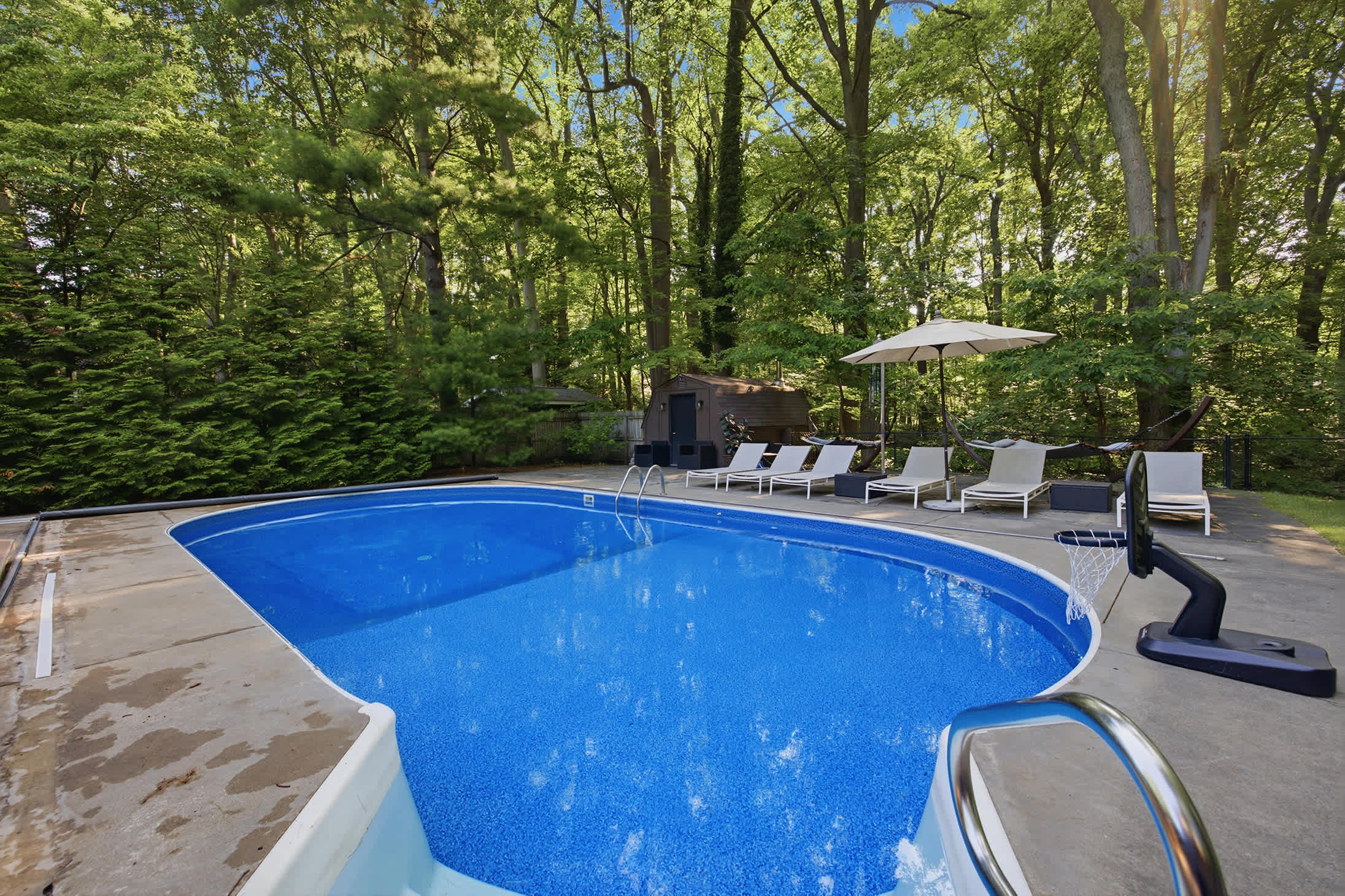 Sun-soaked swims, lazy floats, and lounge time beneath the trees.