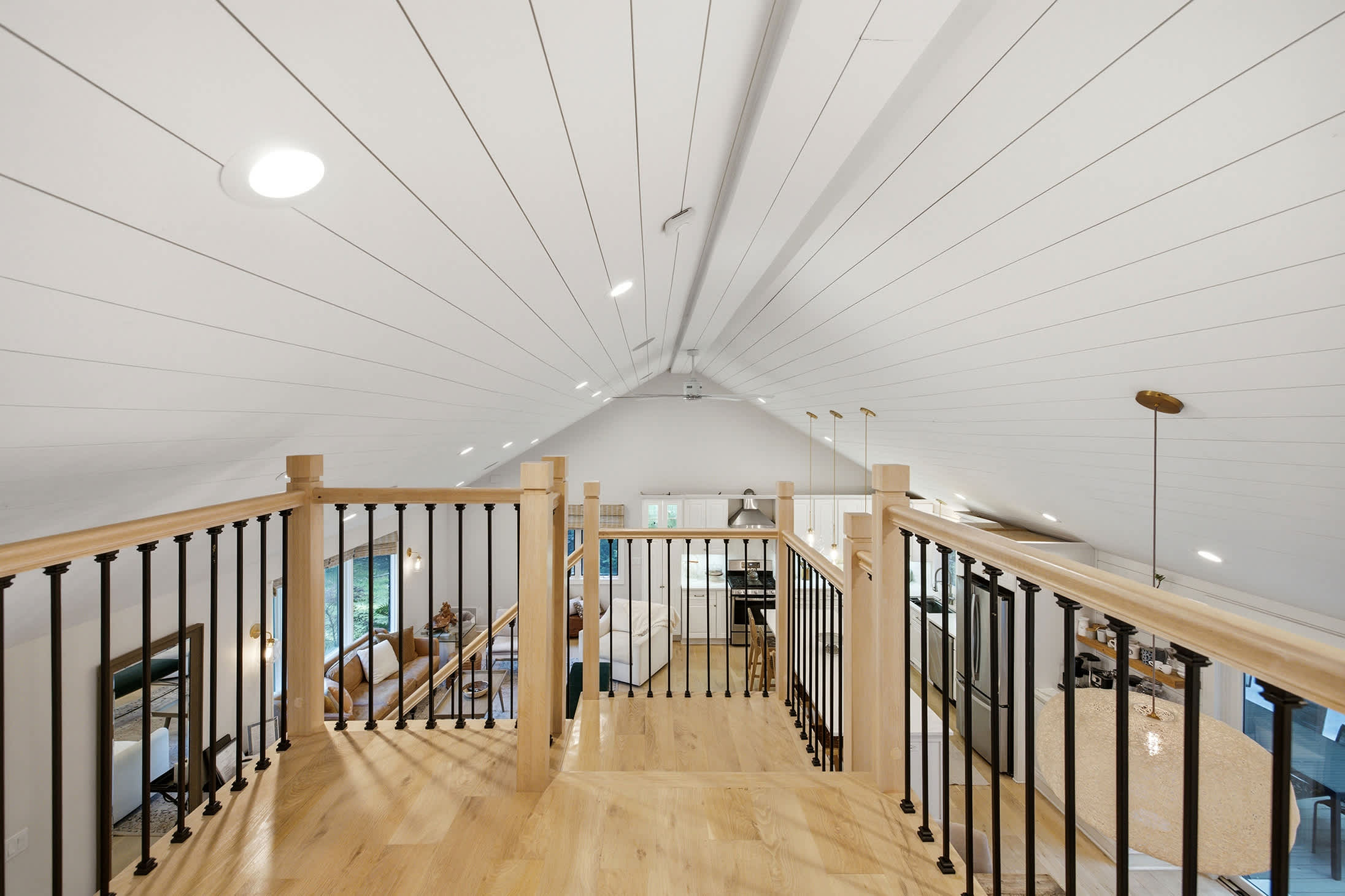 The airy loft vantage point offering a glimpse of every shared moment below.