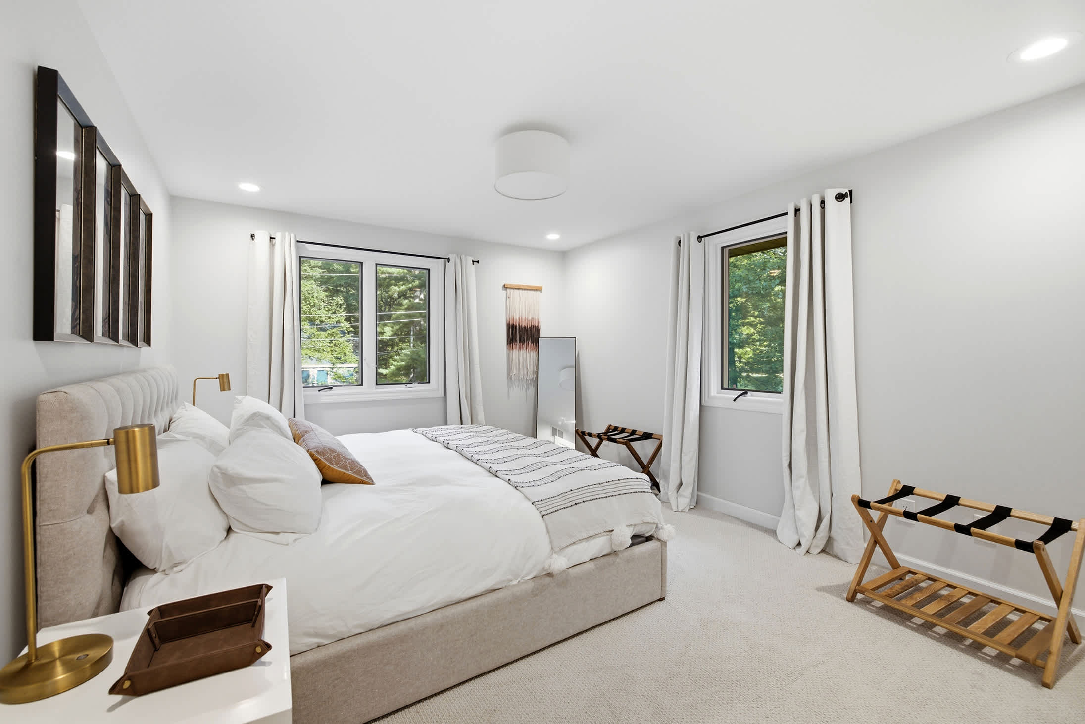 Every bedroom is elevated with supreme linens and lovely forest views.