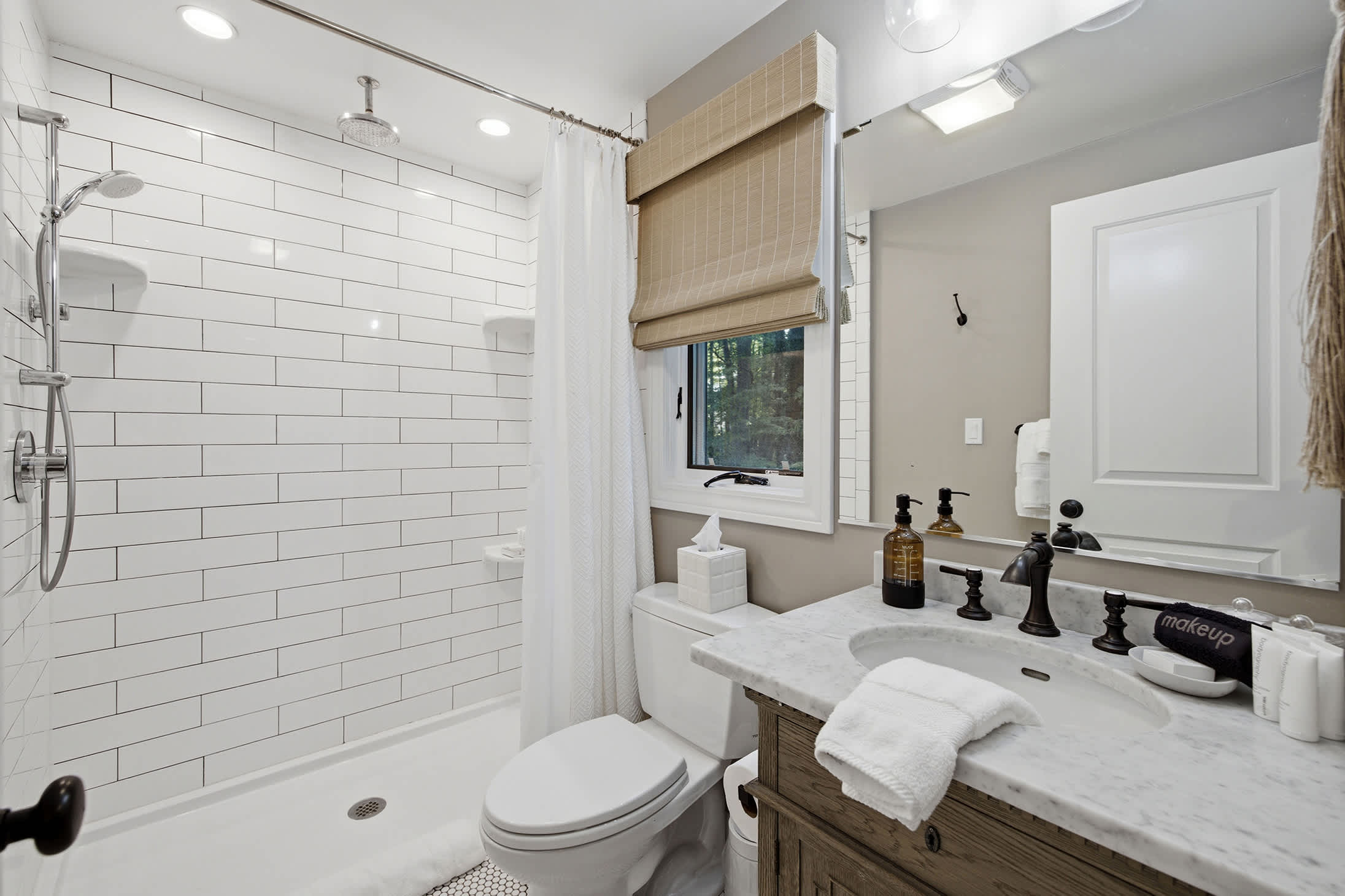 Our bright bathroom is designed for comfort, convenience, and easy routines.