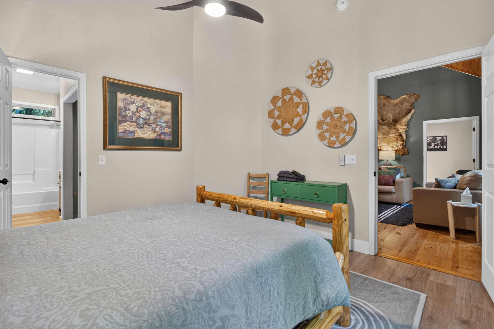 An alternate view of the charming cabin-style bedroom.