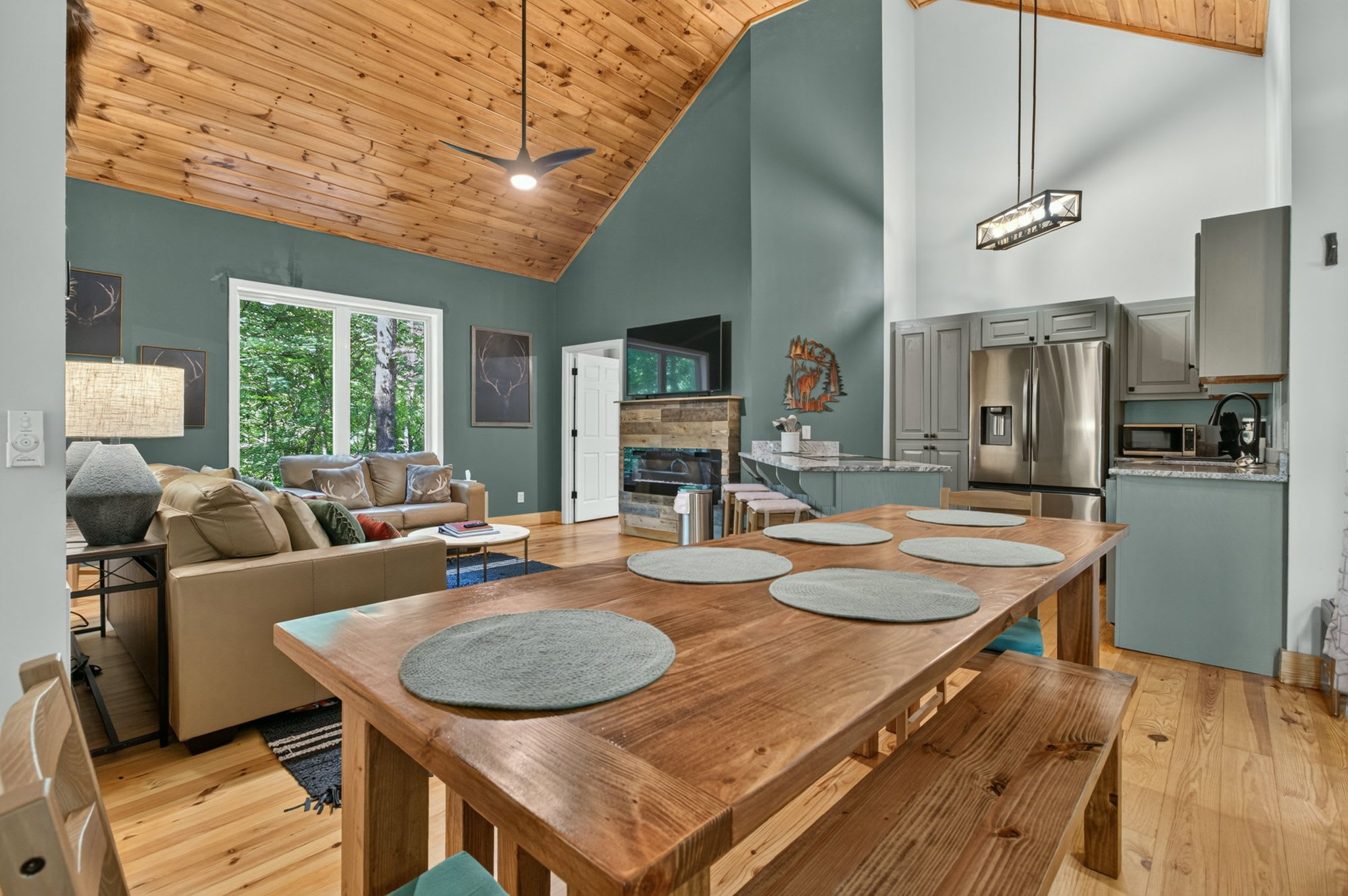 Share meals around the rustic wooden dining table.