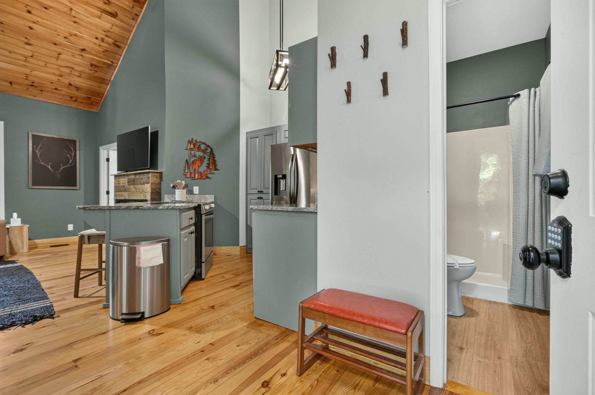 Hang your coats on the rustic hooks as you settle in.