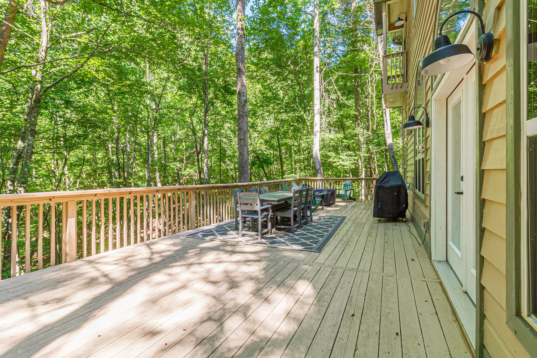 Gather for BBQ nights on the spacious wooden deck.