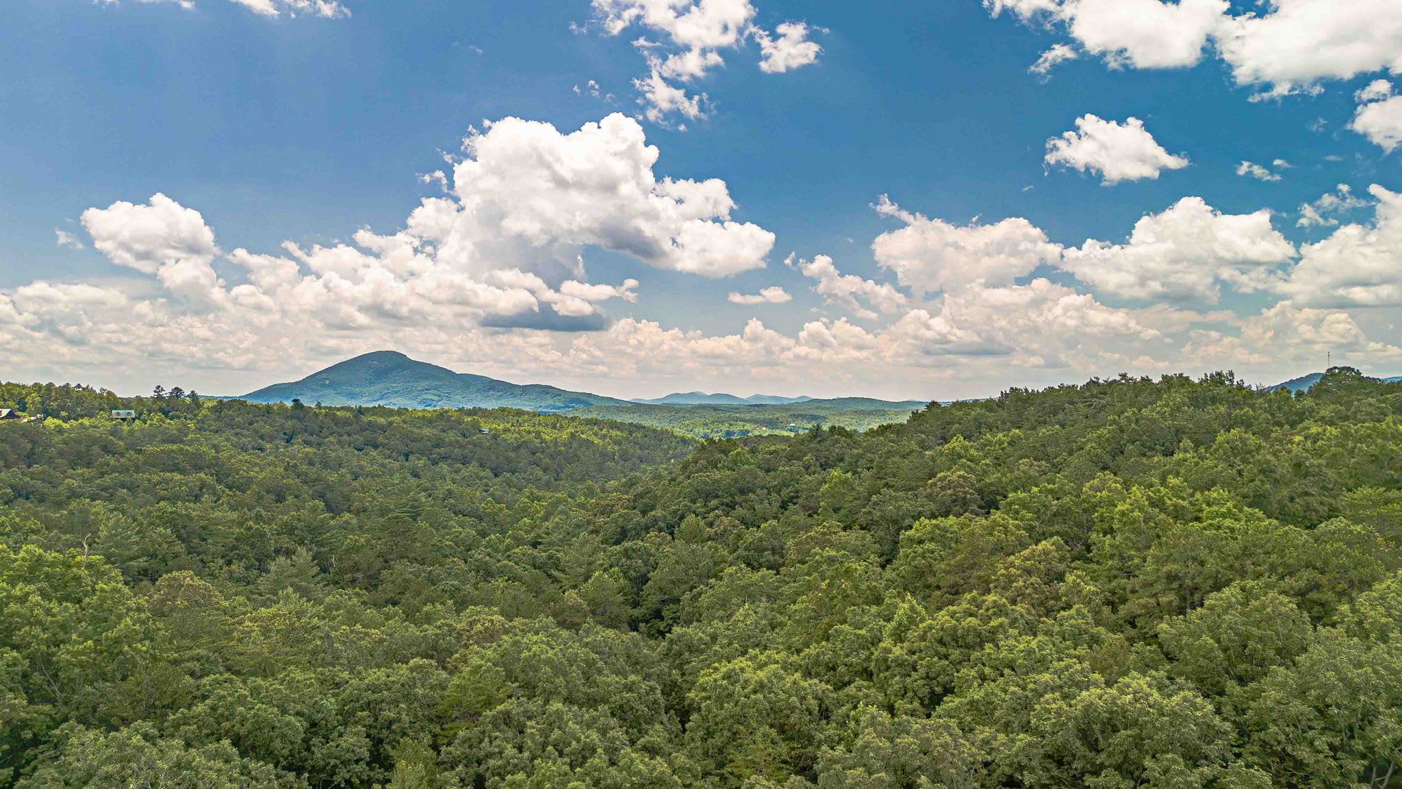 Soak in the beauty of rolling hills and distant mountain peaks.