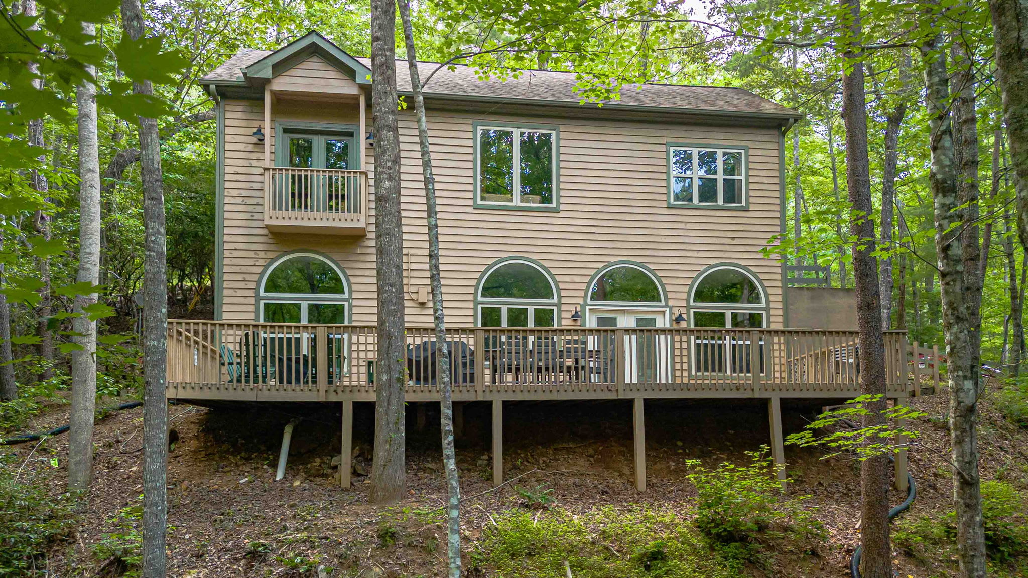 Escape into nature with a spacious deck and private balcony.