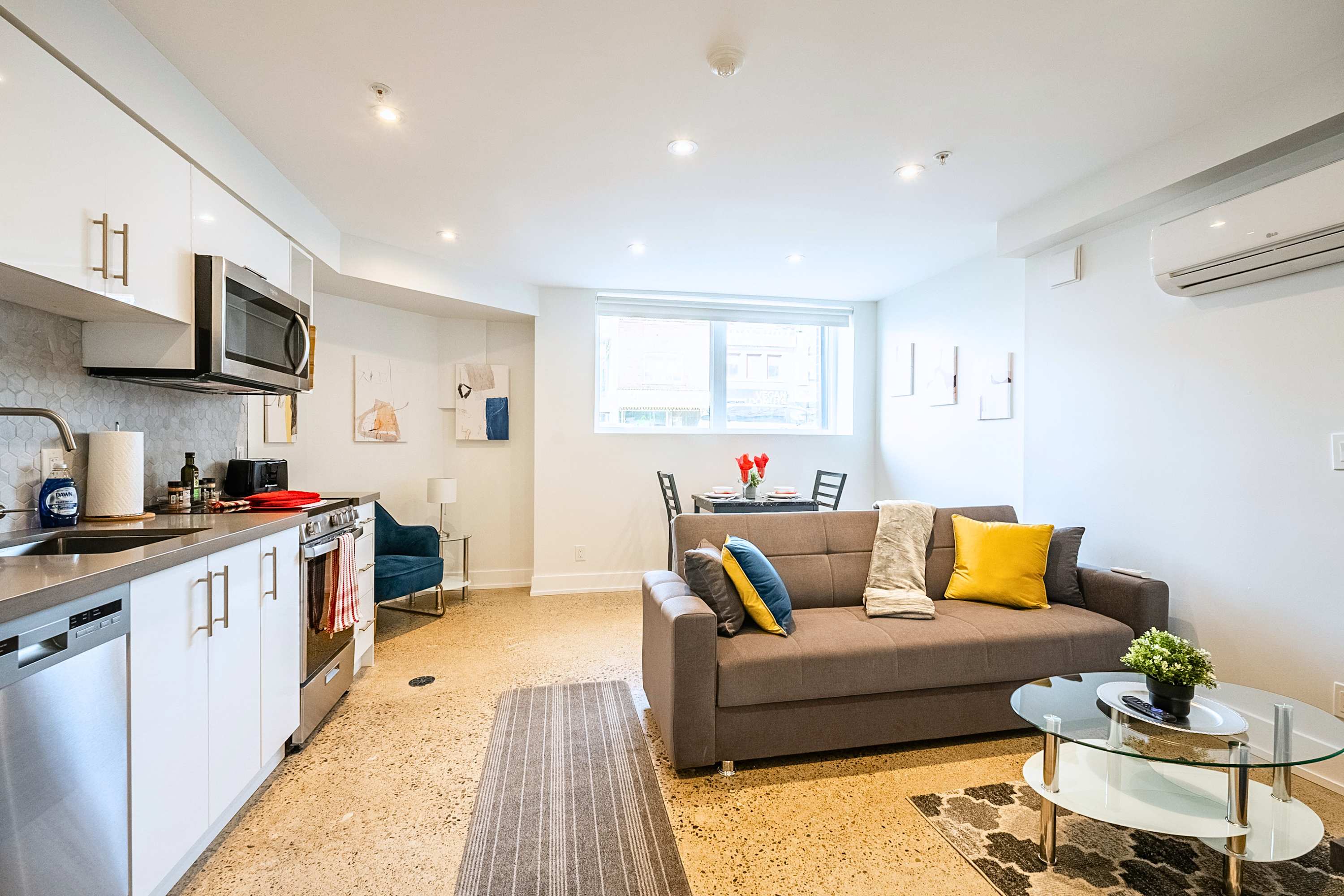 Beautifully connected living and kitchen areas creating a stylish home experience