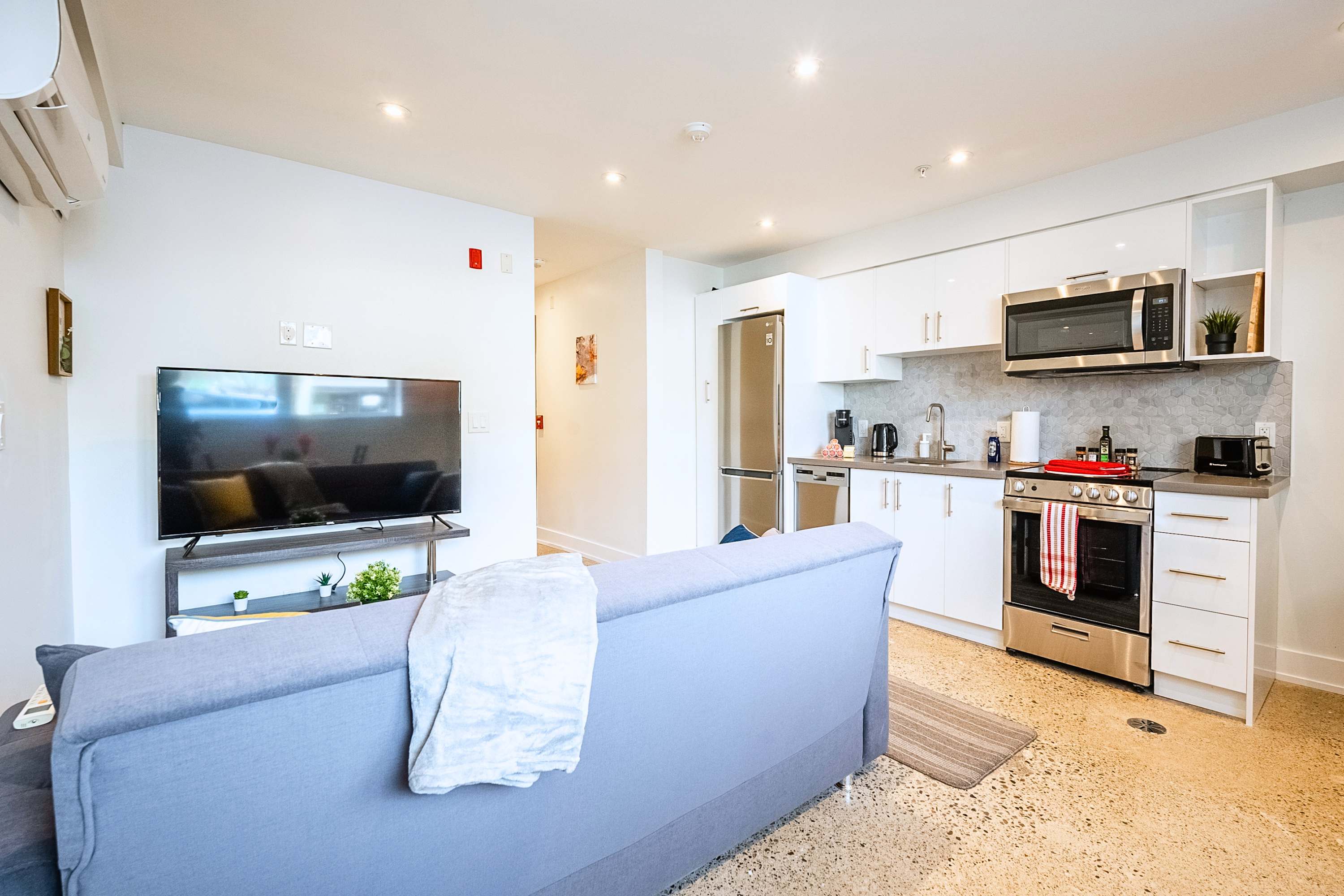 Enjoy a functional open layout where the kitchen and lounge come together beautifully