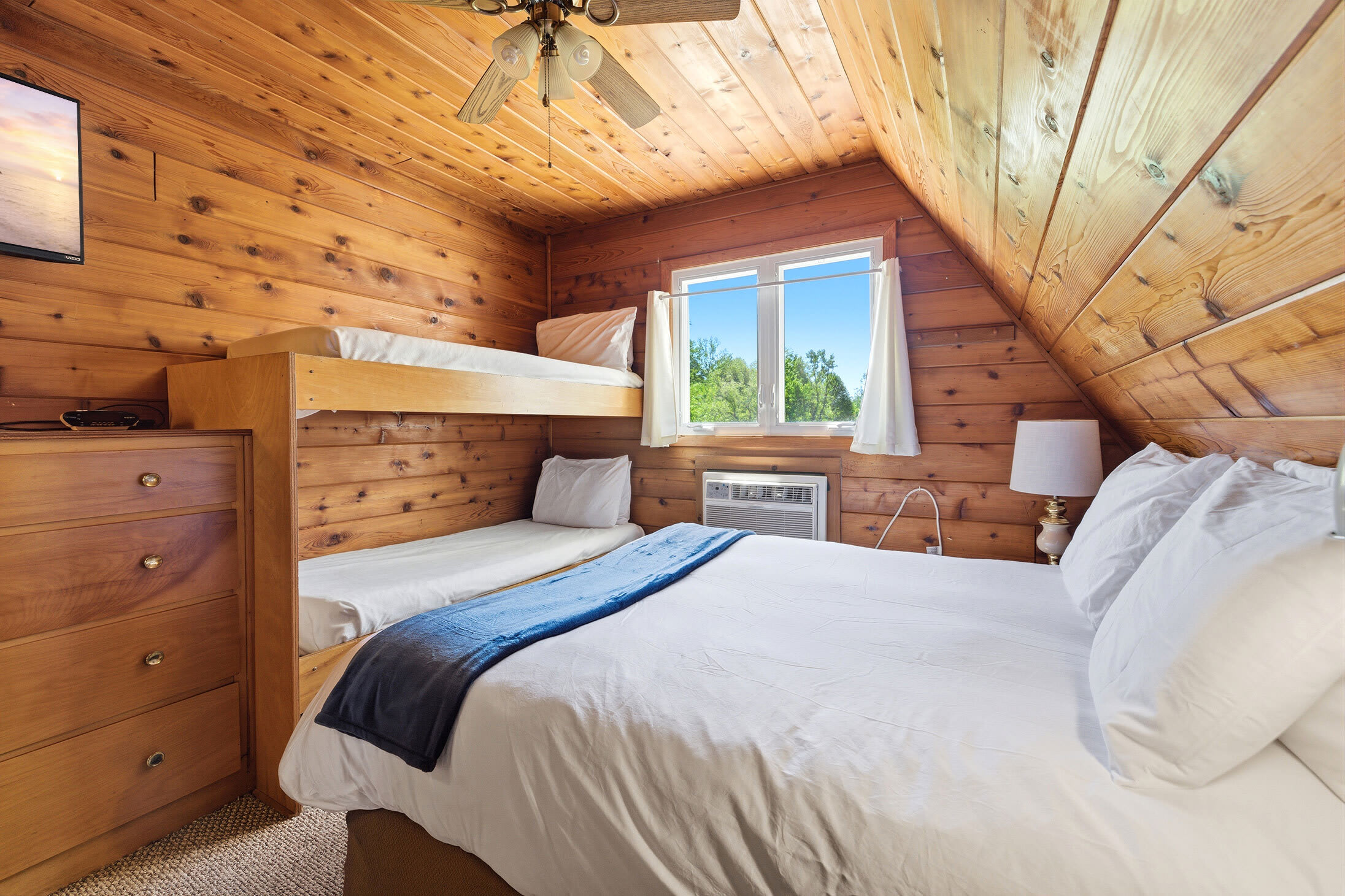 Dedicated bedroom with space for both adults and younger guests.