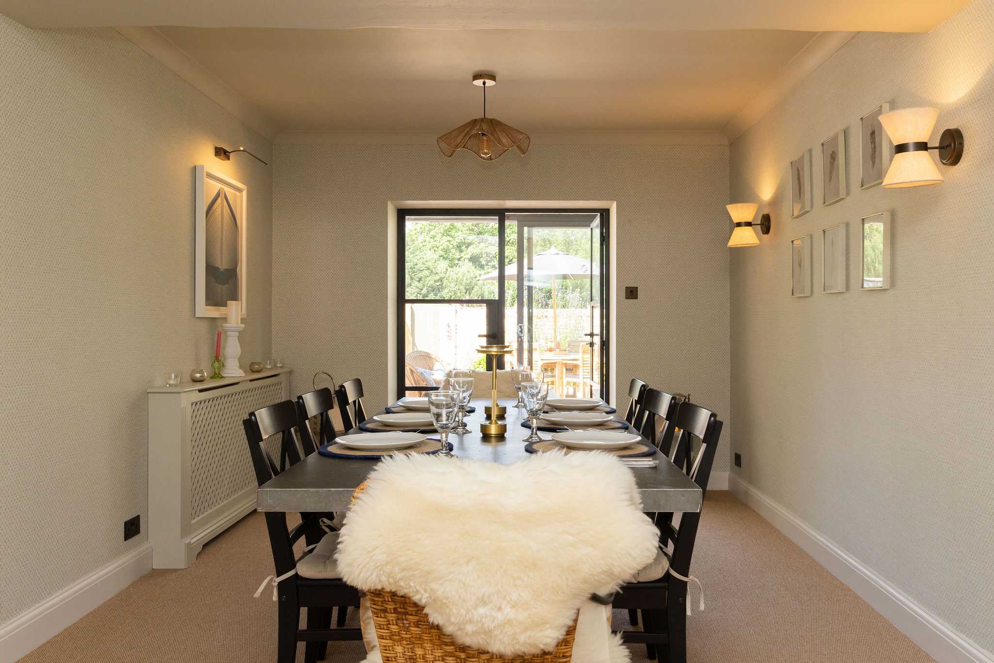 Stylish dining space featuring a generous table and garden outlook for relaxed holiday meals