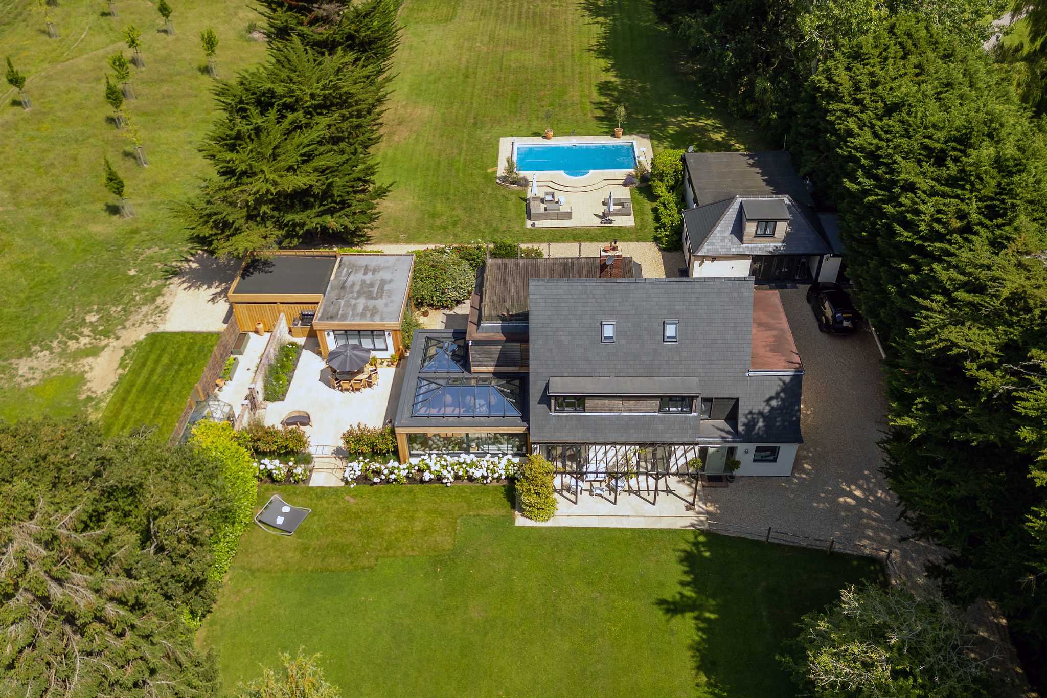 Aerial view showcasing the holiday home, private grounds and exceptional outdoor leisure facilities