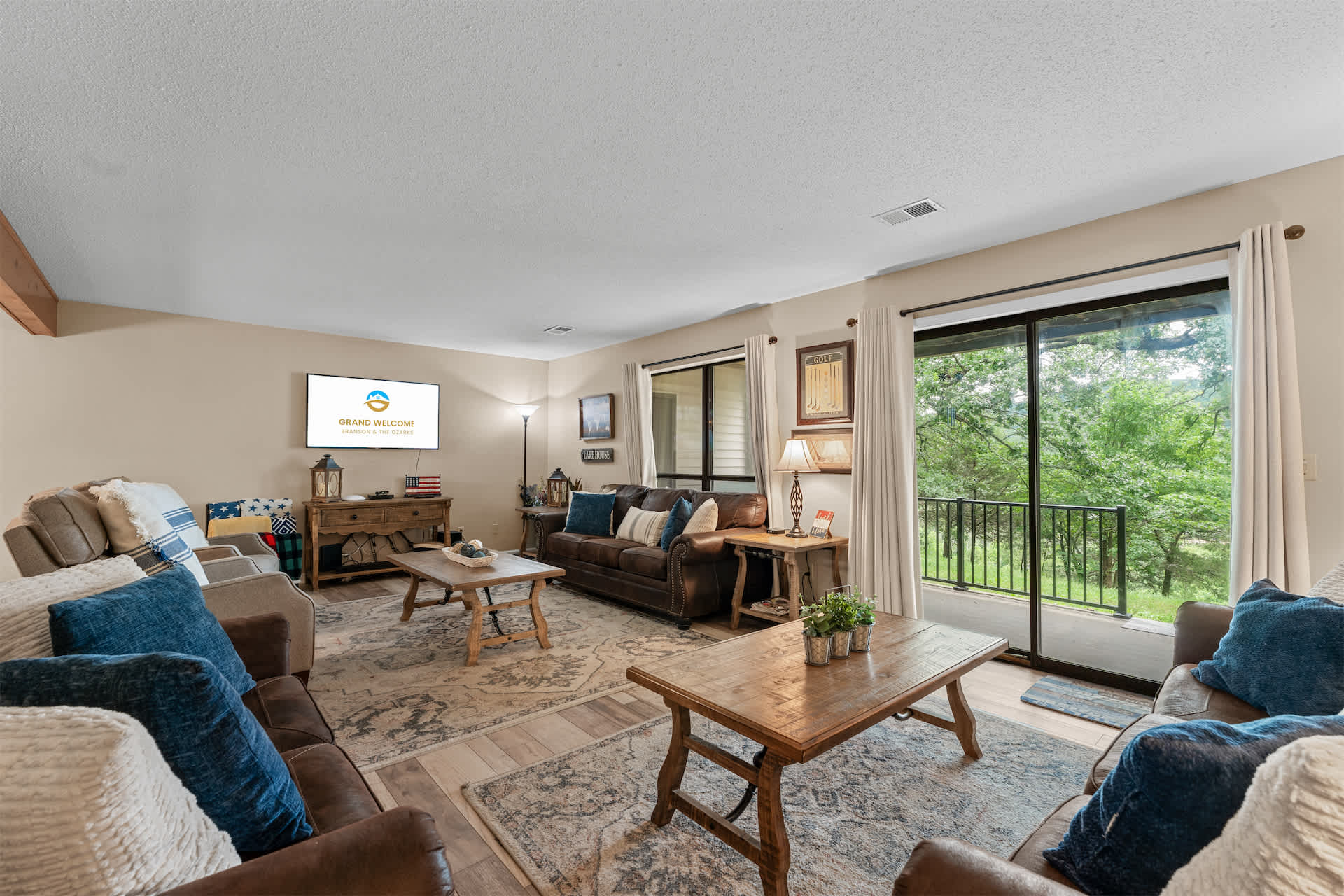 Cozy and spacious living area with TV