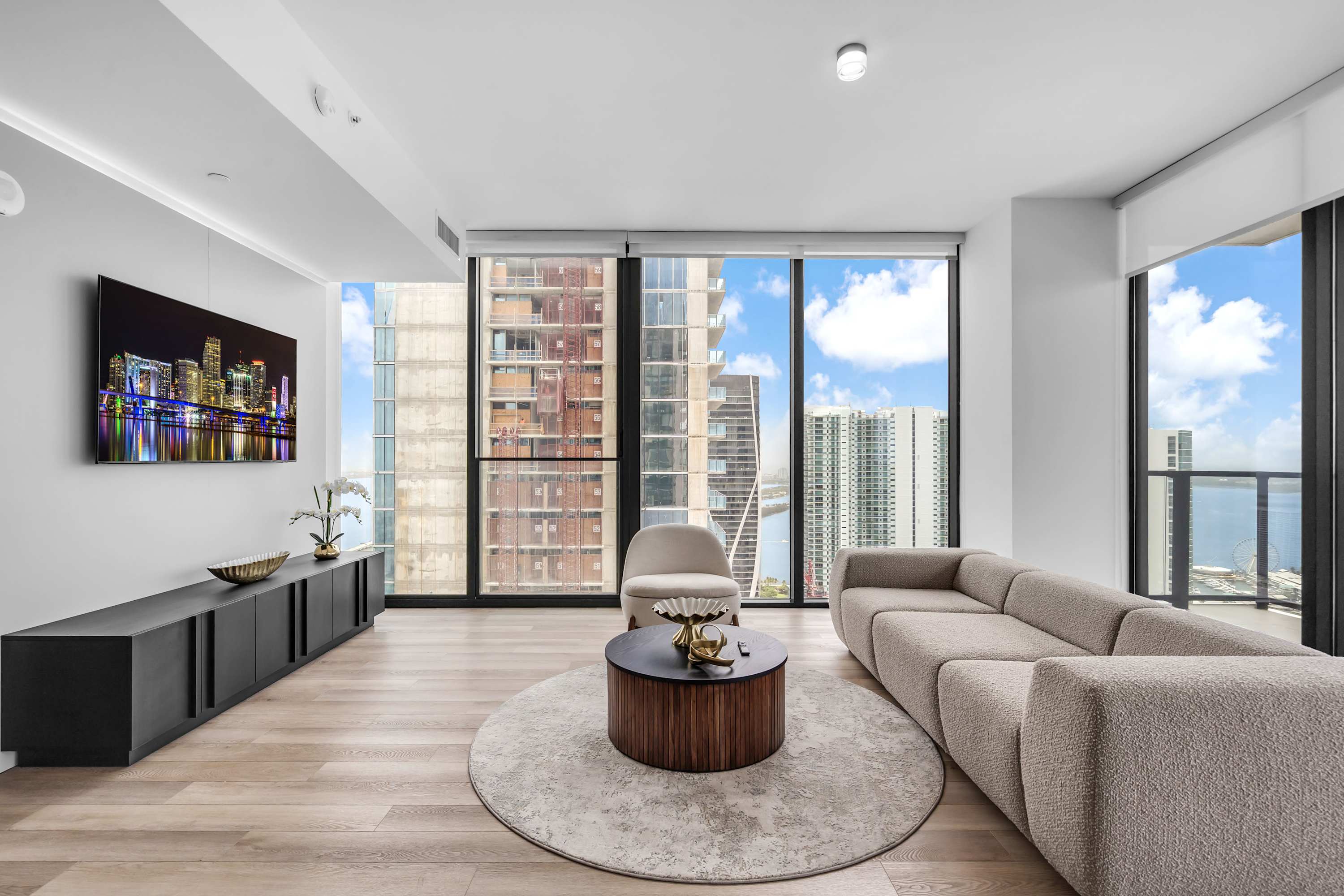 Curl up in the airy living room & stream your favorites on the smart TV​