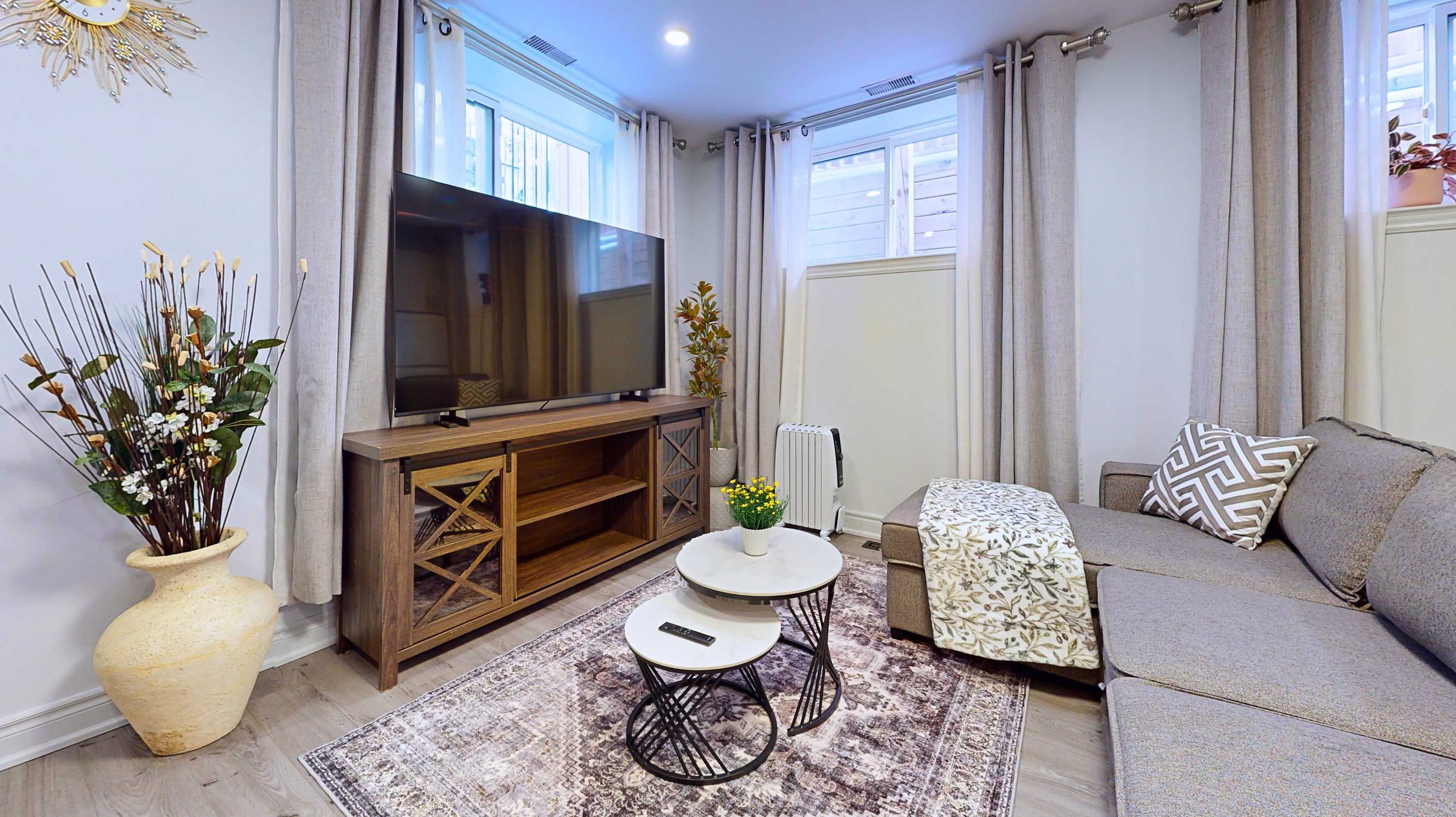 Your perfect spot to unwind with a flat screen TV cozy sleeper sofa and modern design details