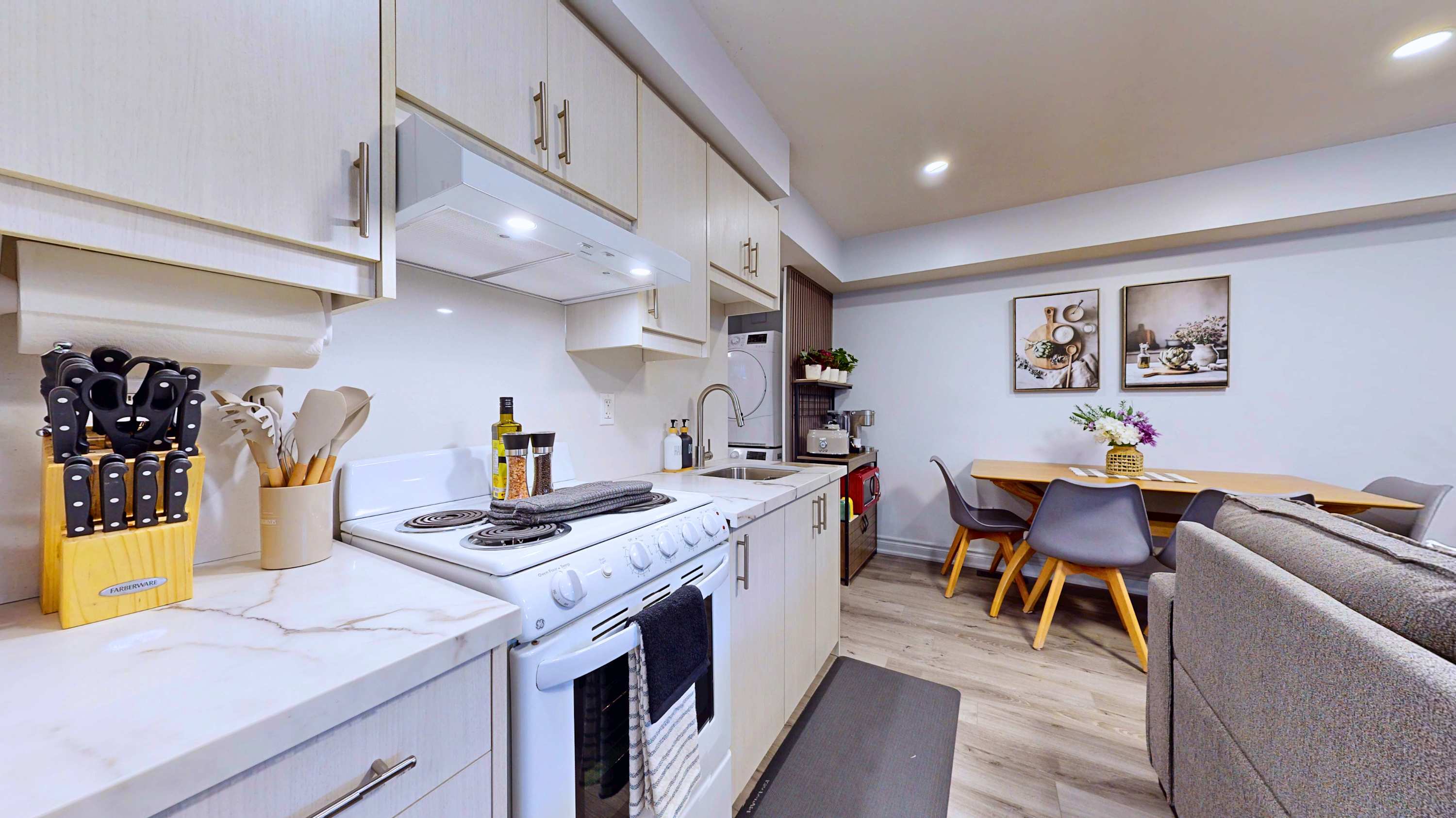 Seamless open plan flow connecting the cooking area dining spot and relaxing lounge