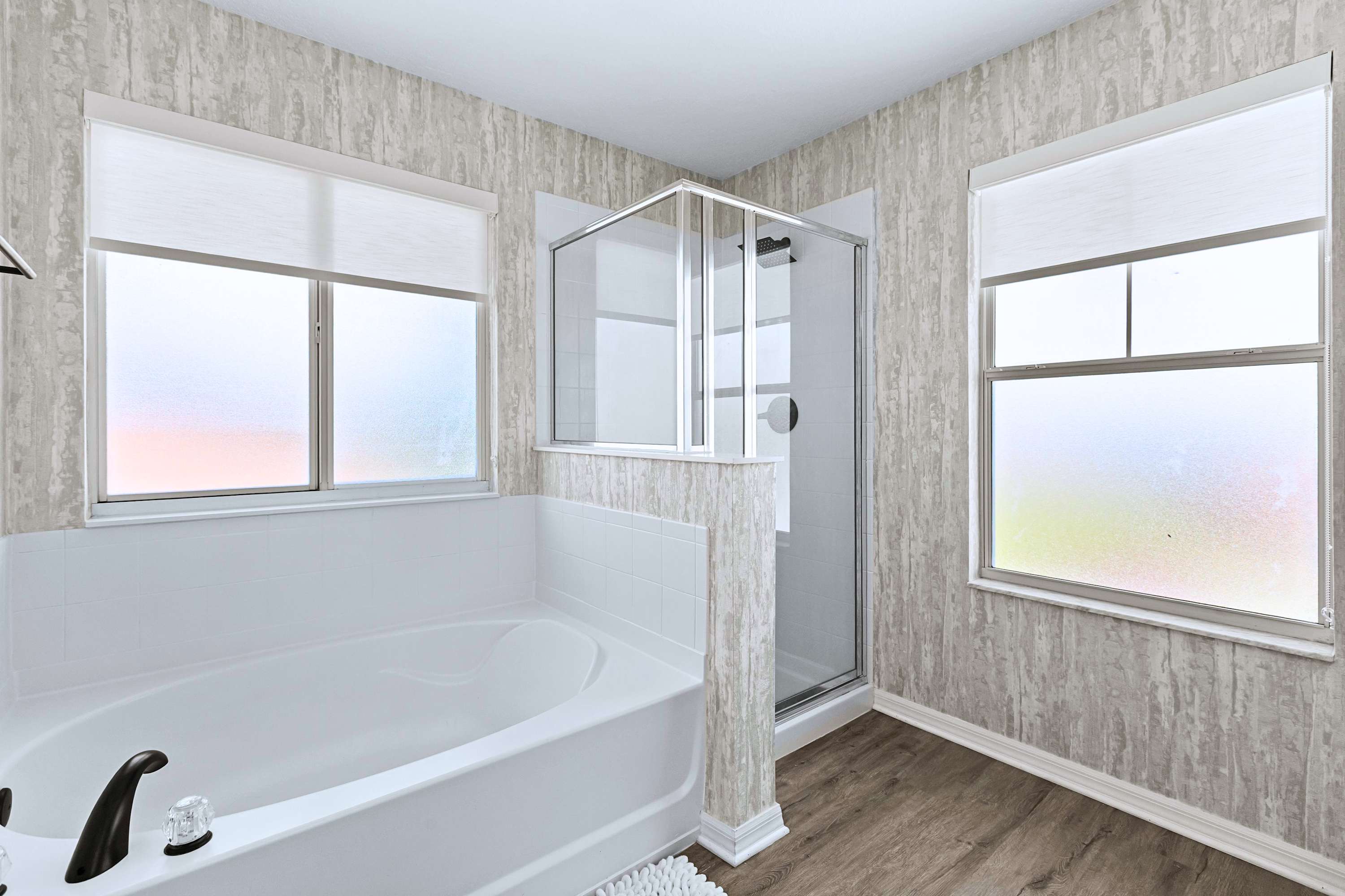 Your personal home spa. Wash the day away in the glass walk in shower or enjoy a long relaxing soak in the deep tub