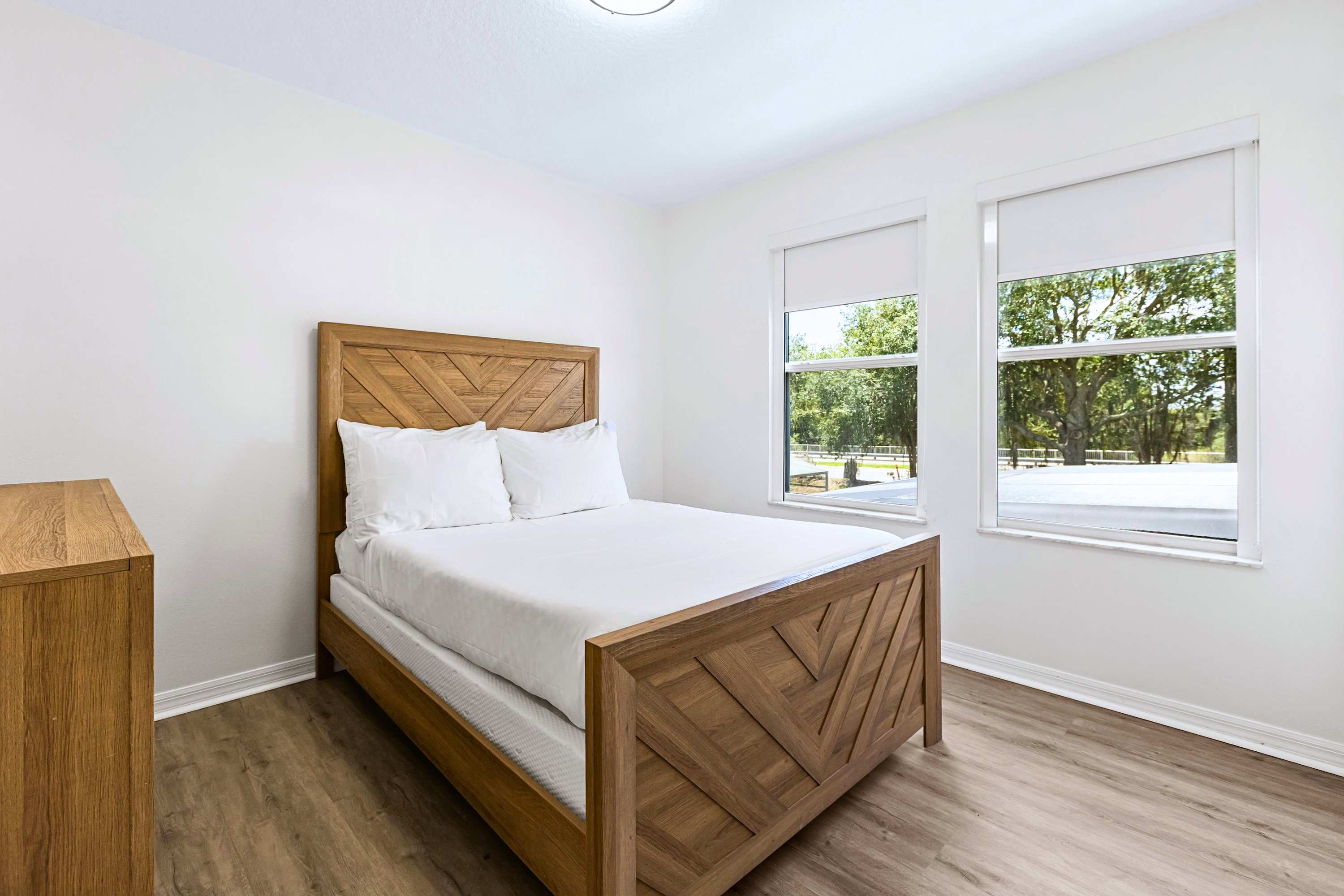 Slip into ultimate relaxation. A beautifully dressed double bed with cloud-soft linens designed for a perfect night of sleep