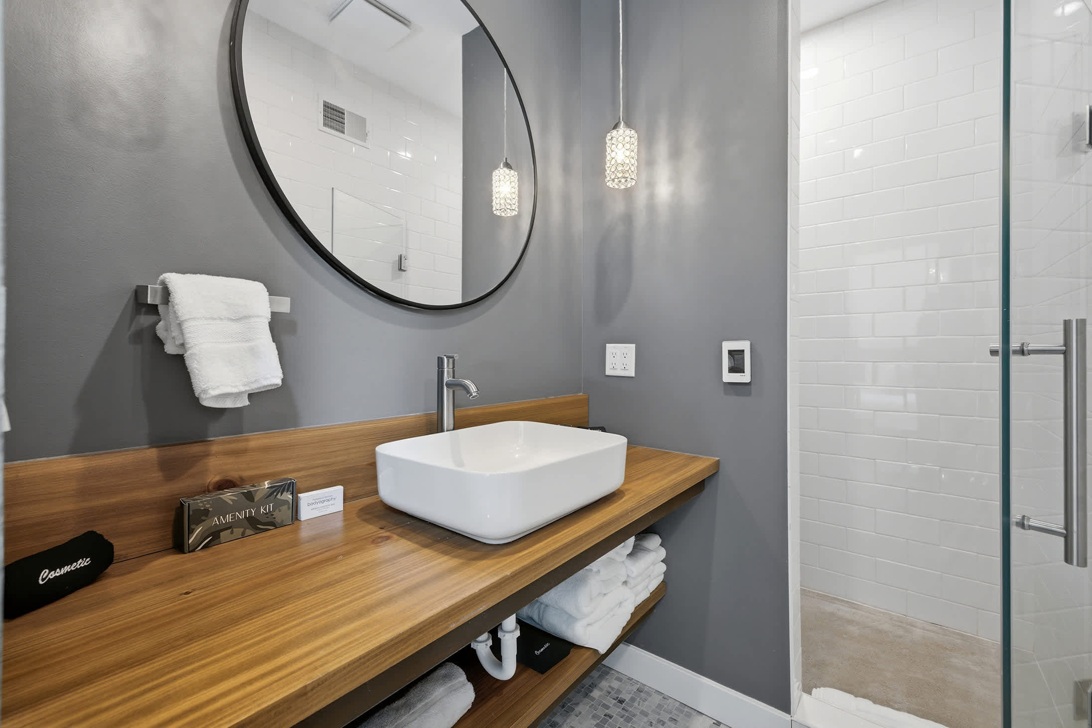 Private ensuite offers a spacious vanity and glass walk in shower.