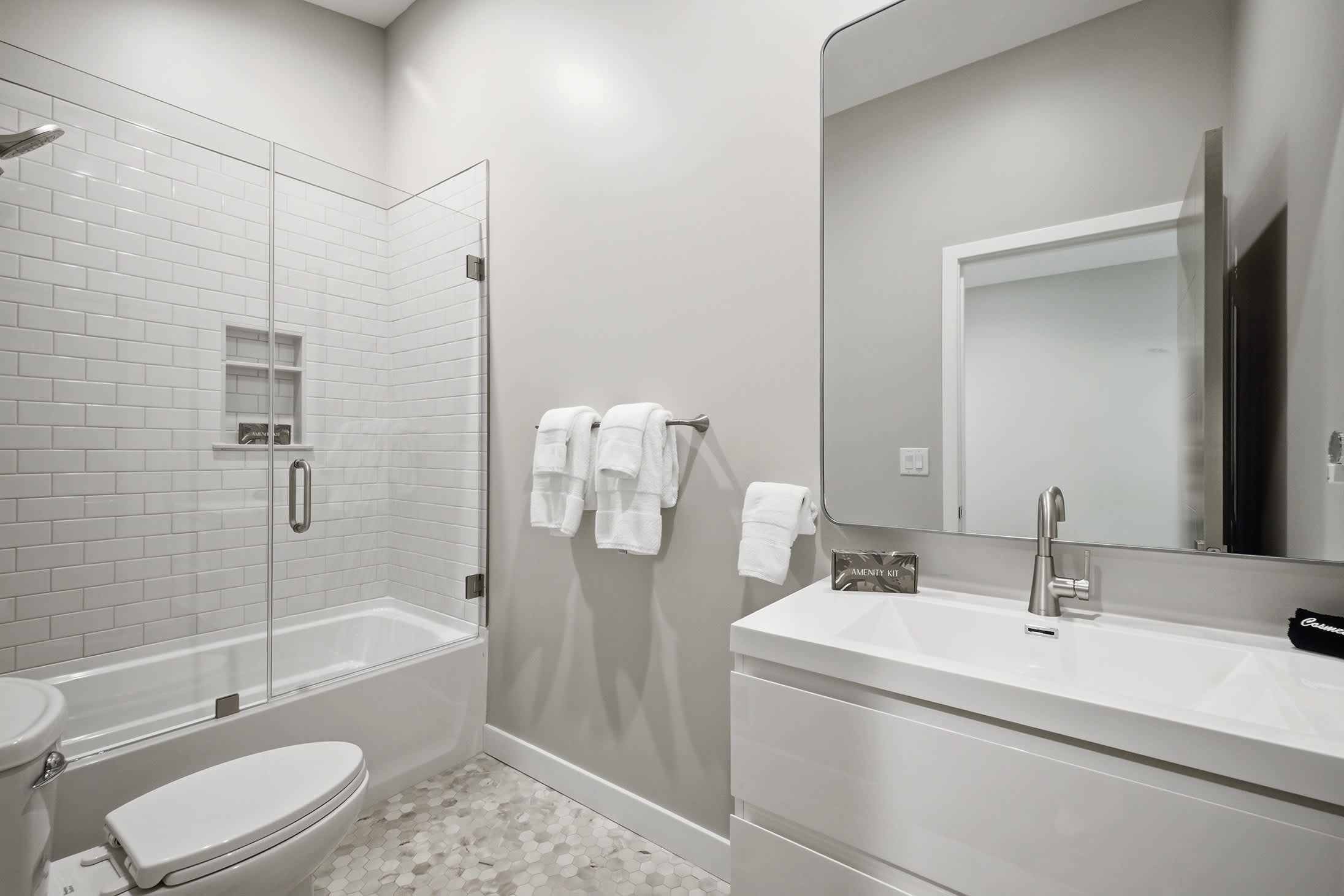 Upper level bathroom includes a tub and shower for added flexibility.