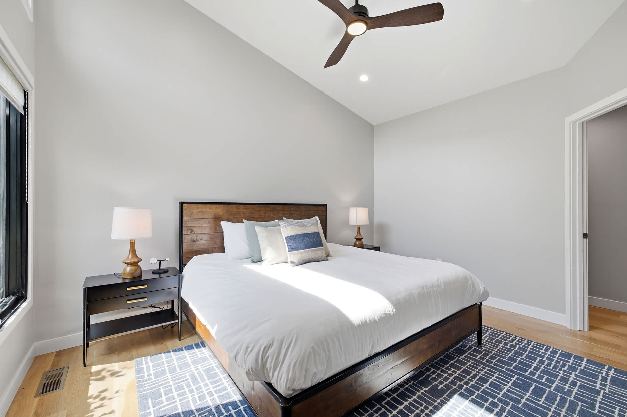 The Main Bedroom is on the upper level and has a king-size bed.