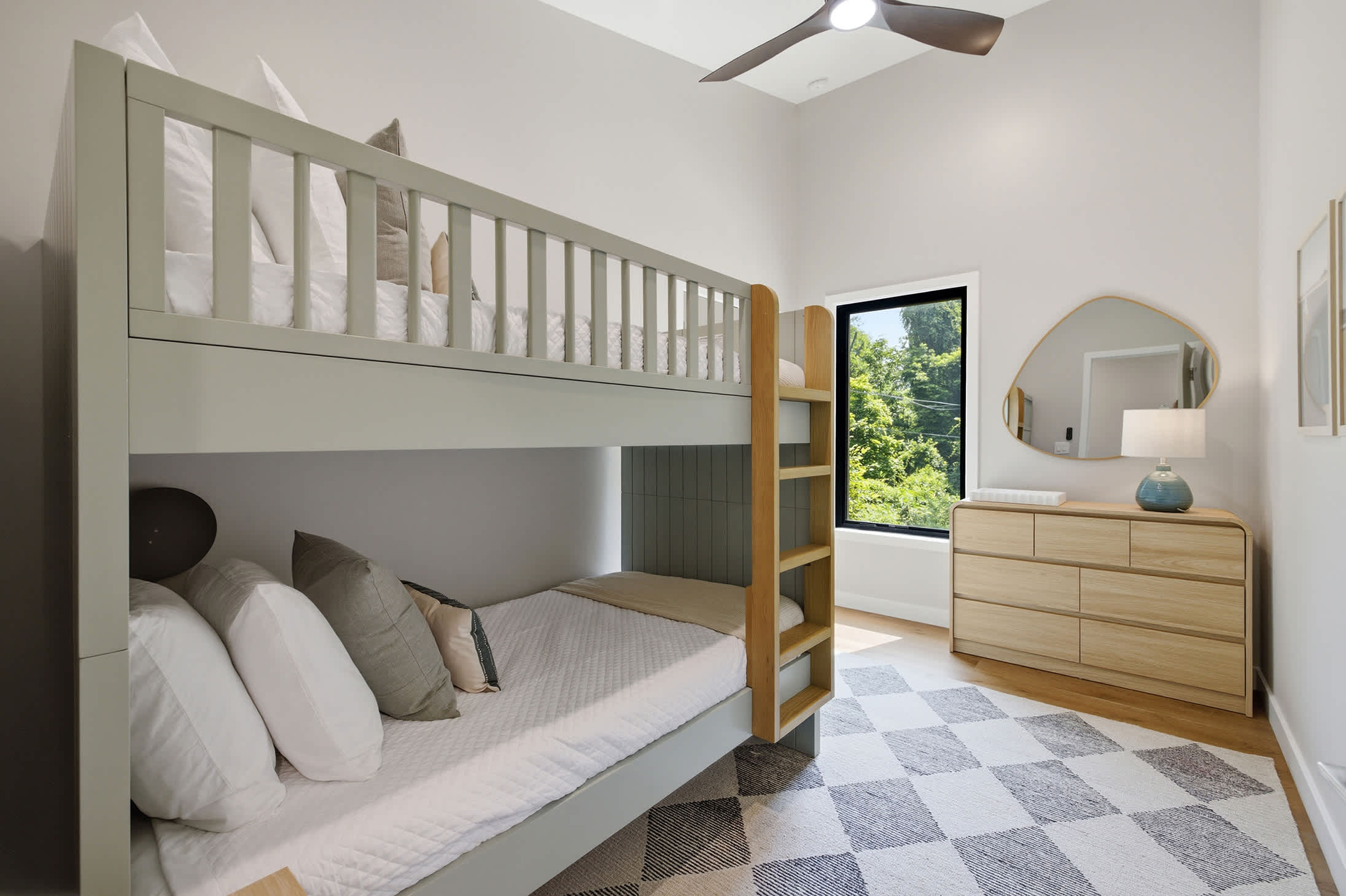 Bedroom 3 is on the upper level and has a single bunk bed.