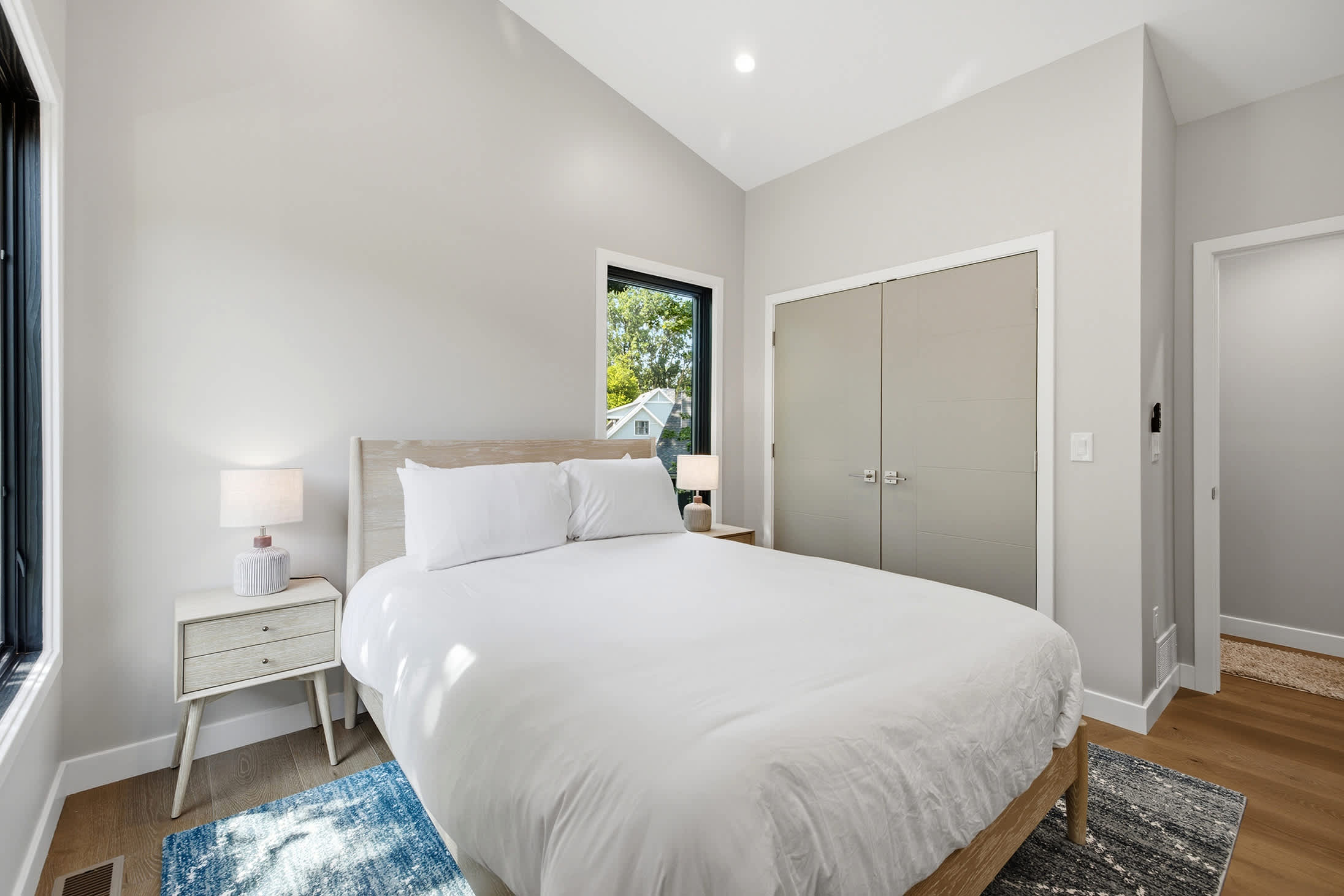 Large windows and vaulted ceilings create a bright, relaxing retreat.