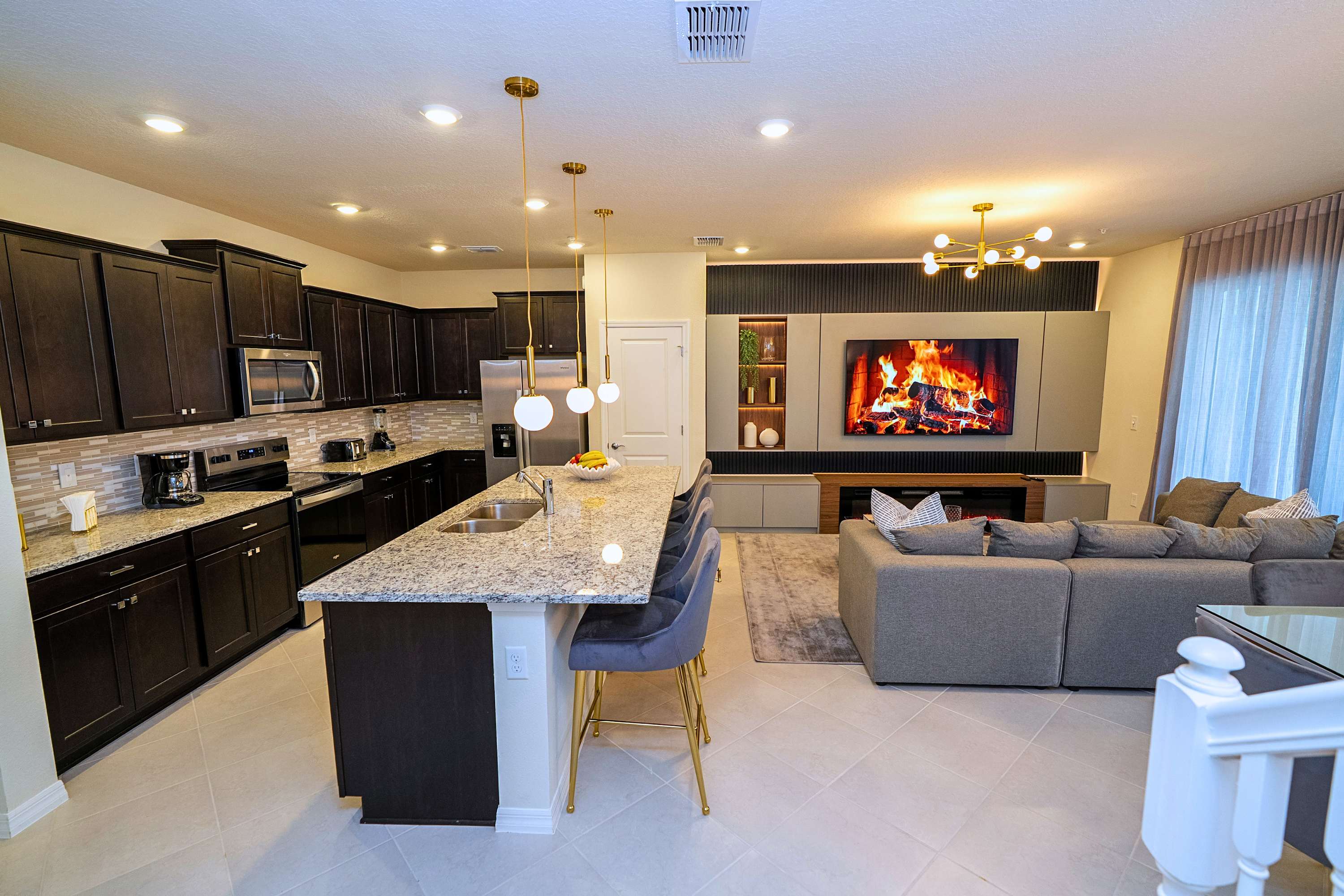 The heart of the home, beautifully connecting the modern kitchen with the living area for a seamless, spacious feel