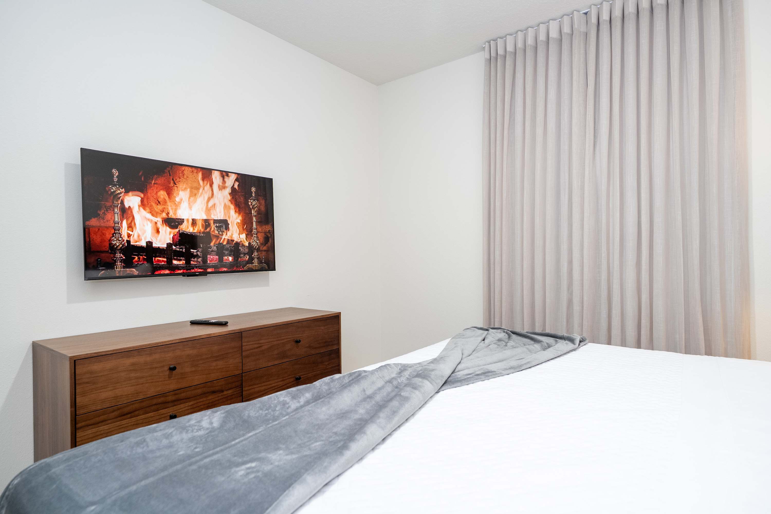 Enjoy movie nights from the king bed, complete with a flat-screen TV and a stylish low console underneath