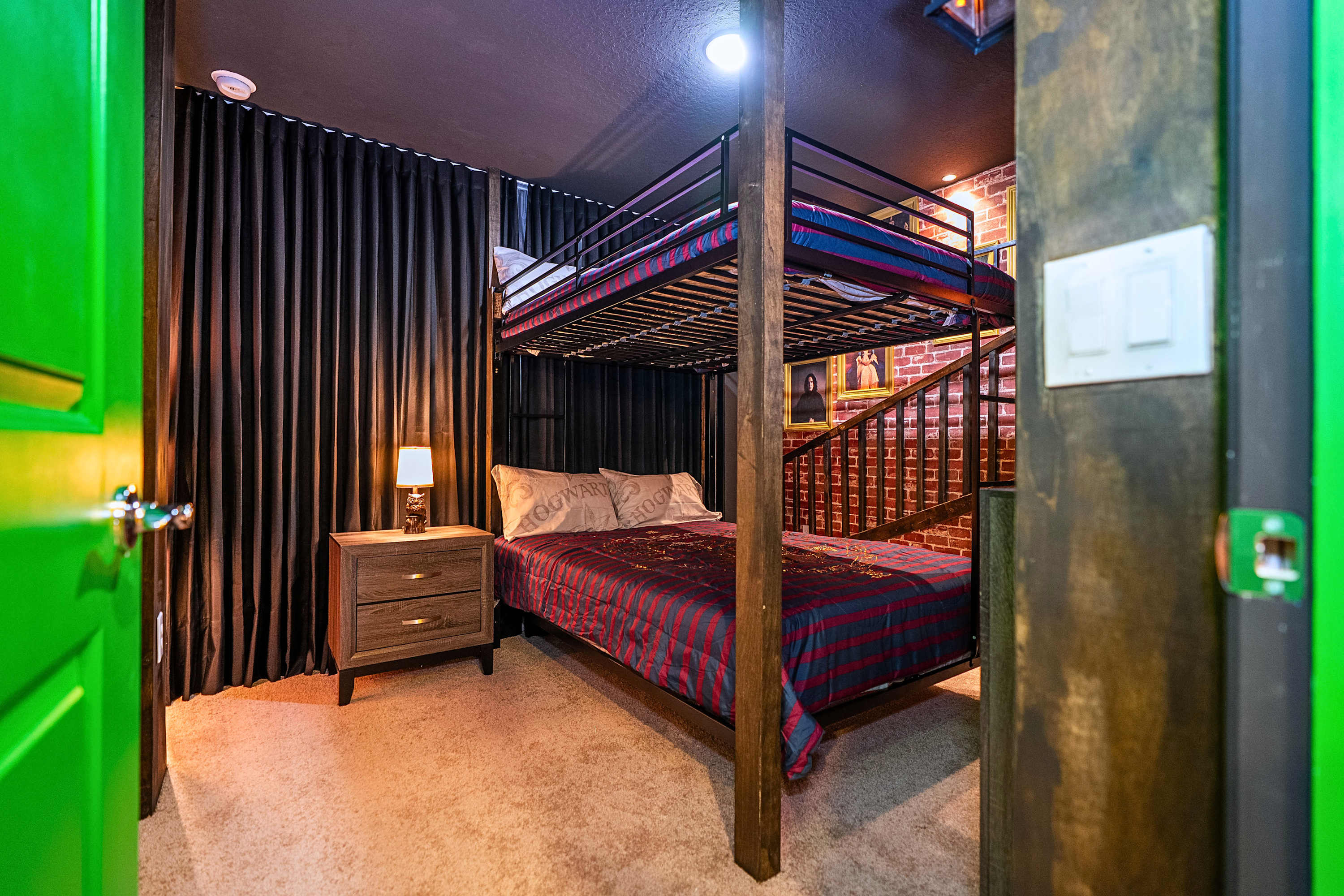 A spellbinding kids' room featuring cozy bunk beds styled with magical Harry Potter details