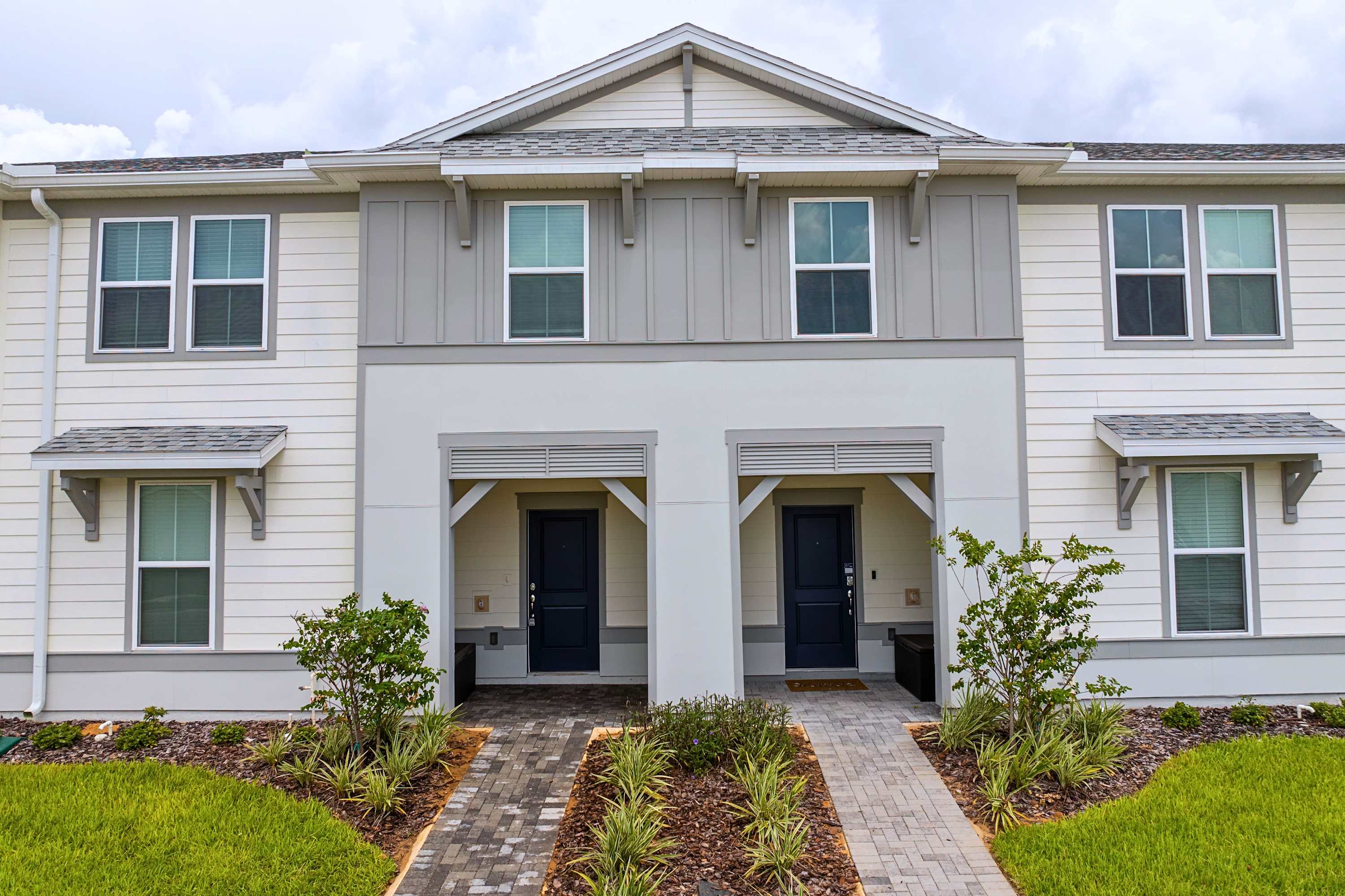 The beautiful main exterior of the house, capturing its striking architectural design from the front yard