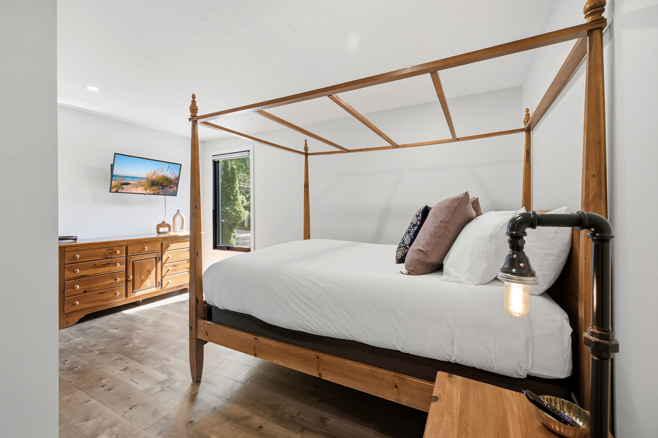 Canopy double bed designed with comfort and relaxation in mind.