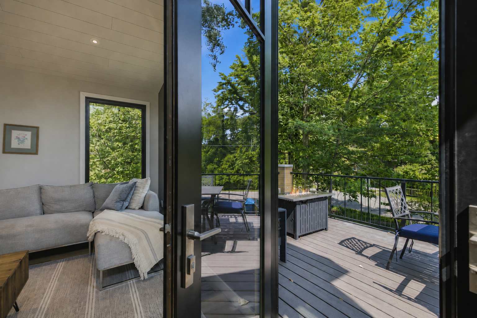 Move from the living room onto the deck for seamless indoor outdoor living.