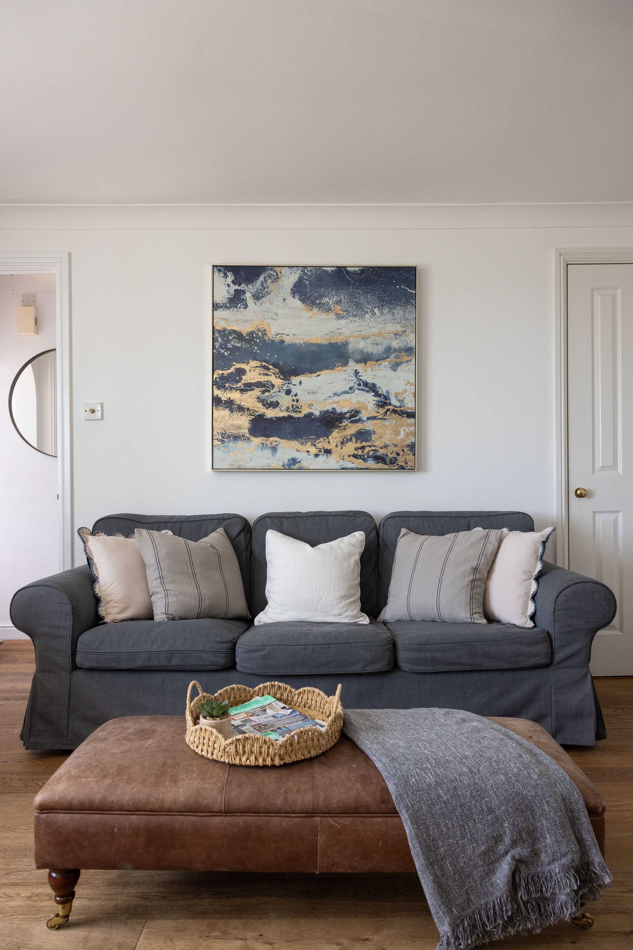 Comfortable lounge with plush seating, creating a relaxing base for your seaside holiday home.