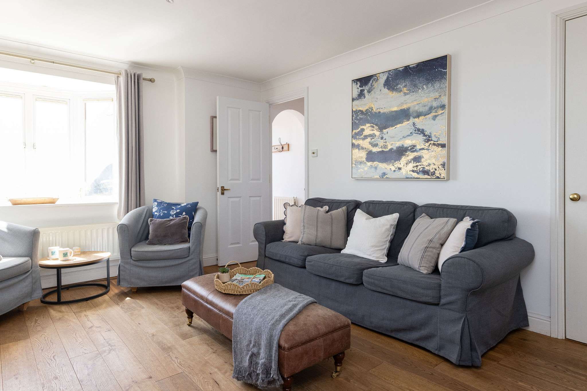 Comfortable lounge with stylish furnishings, perfect for unwinding after a memorable beach day.