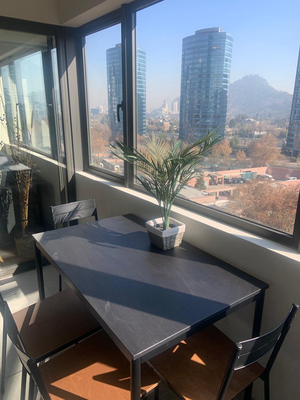 Enjoy meals with stunning city views from this bright dining area, perfect for relaxing and taking in the skyline.