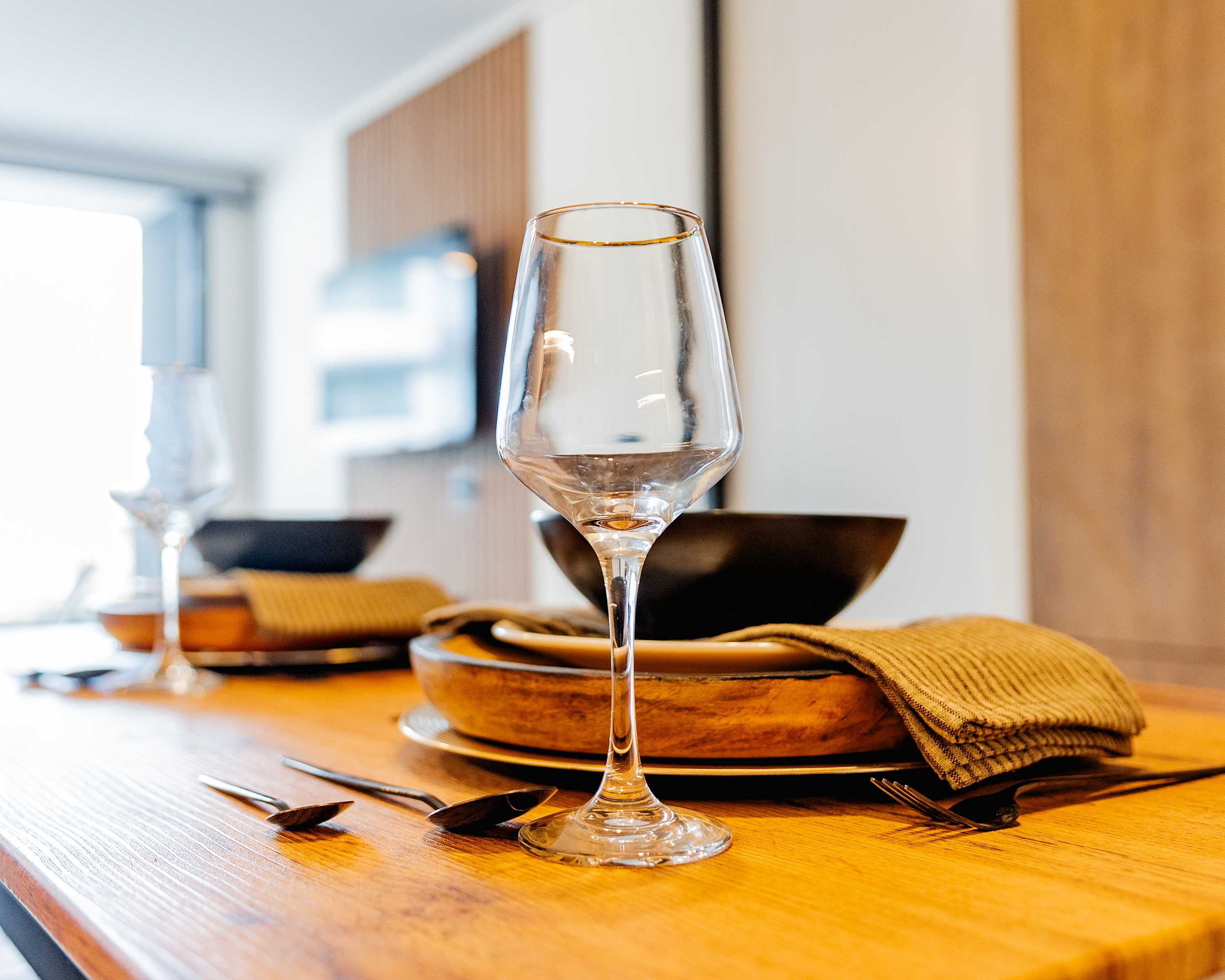 Elegant dining setup with modern touches, perfect for intimate meals in a cozy studio apartment.