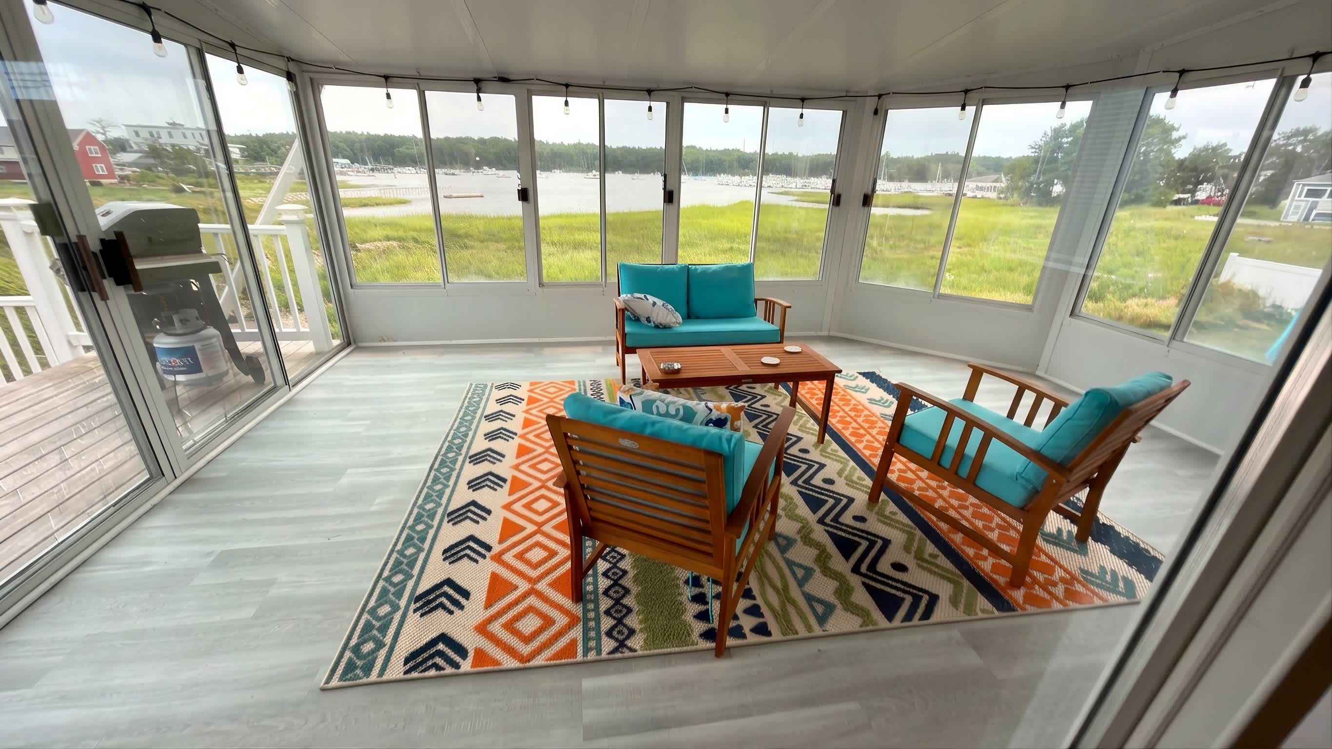 Sip morning coffee or an evening cocktail in the sunroom​
