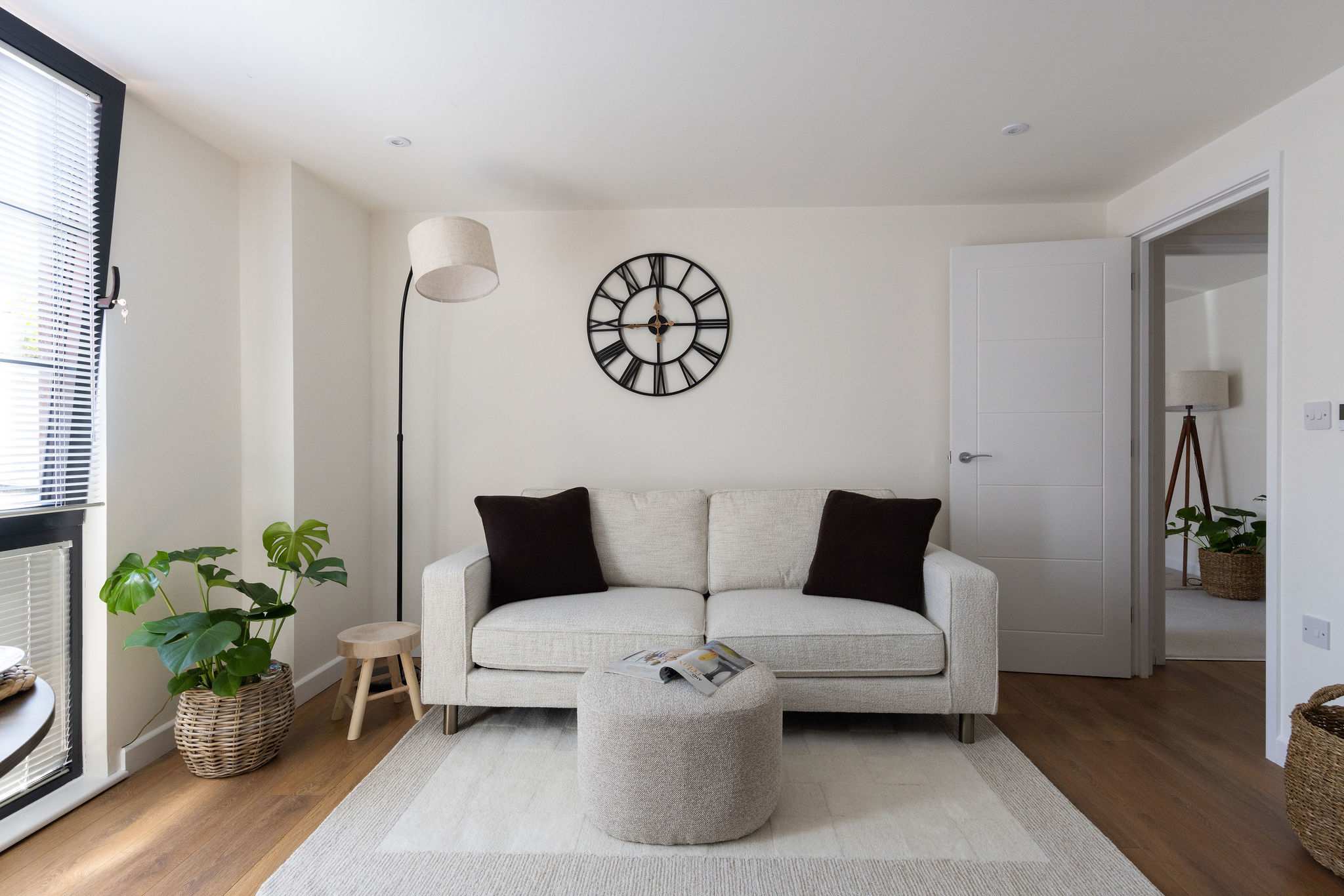 Bright and inviting lounge with comfortable seating, ideal for relaxing after exploring Chichester.