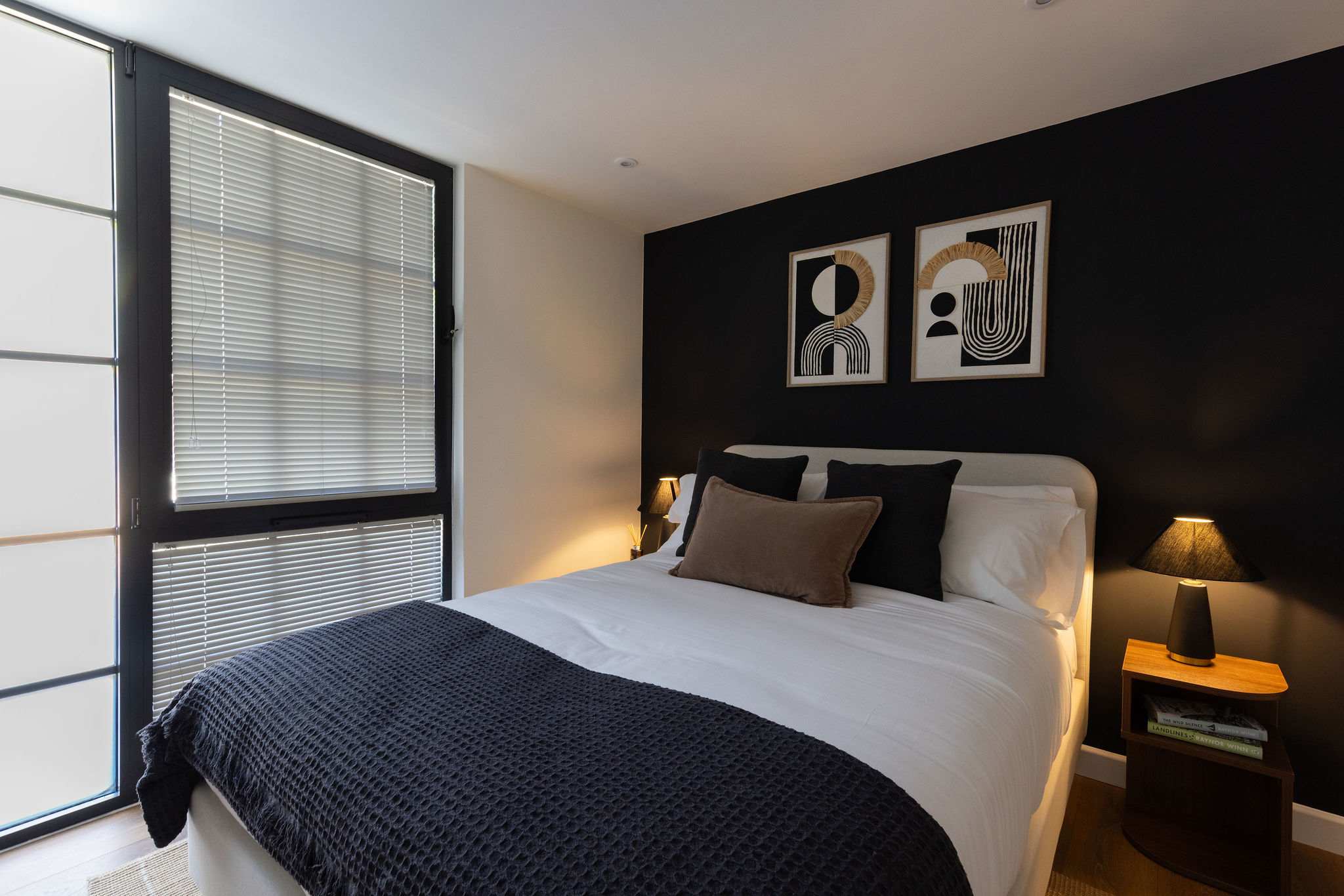 Stylish double bedroom with contemporary décor, creating a relaxing base for your Chichester city break.