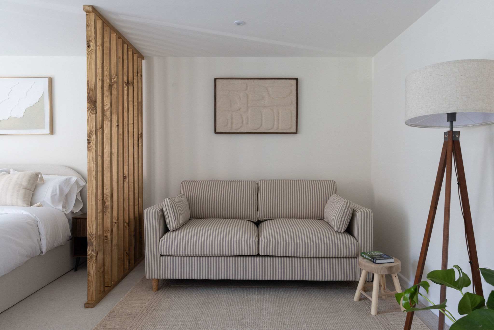 Comfortable seating area within the spacious bedroom, ideal for relaxing after a day exploring.