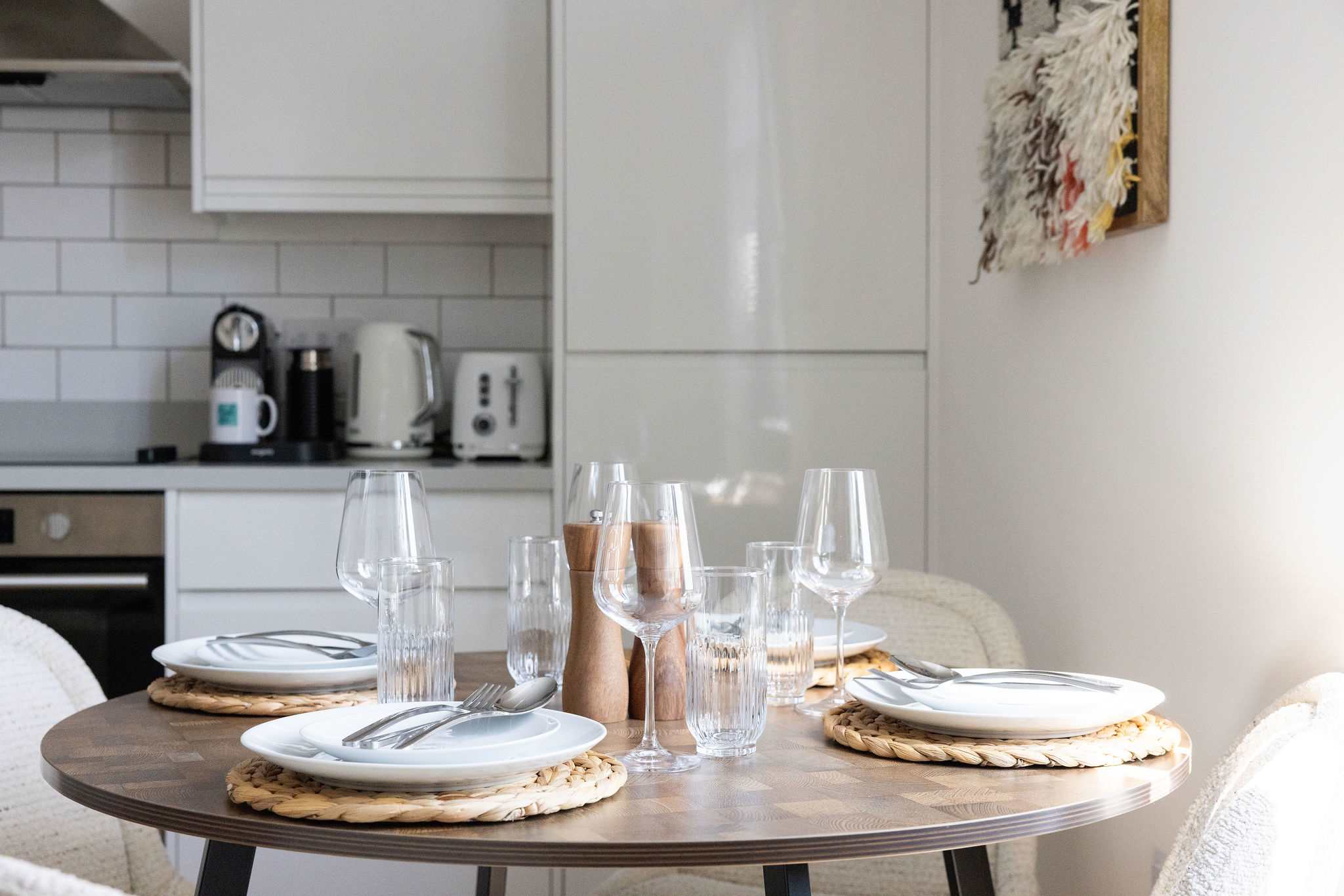 Stylish dining area beside the modern kitchen, perfect for relaxed meals and morning coffee.