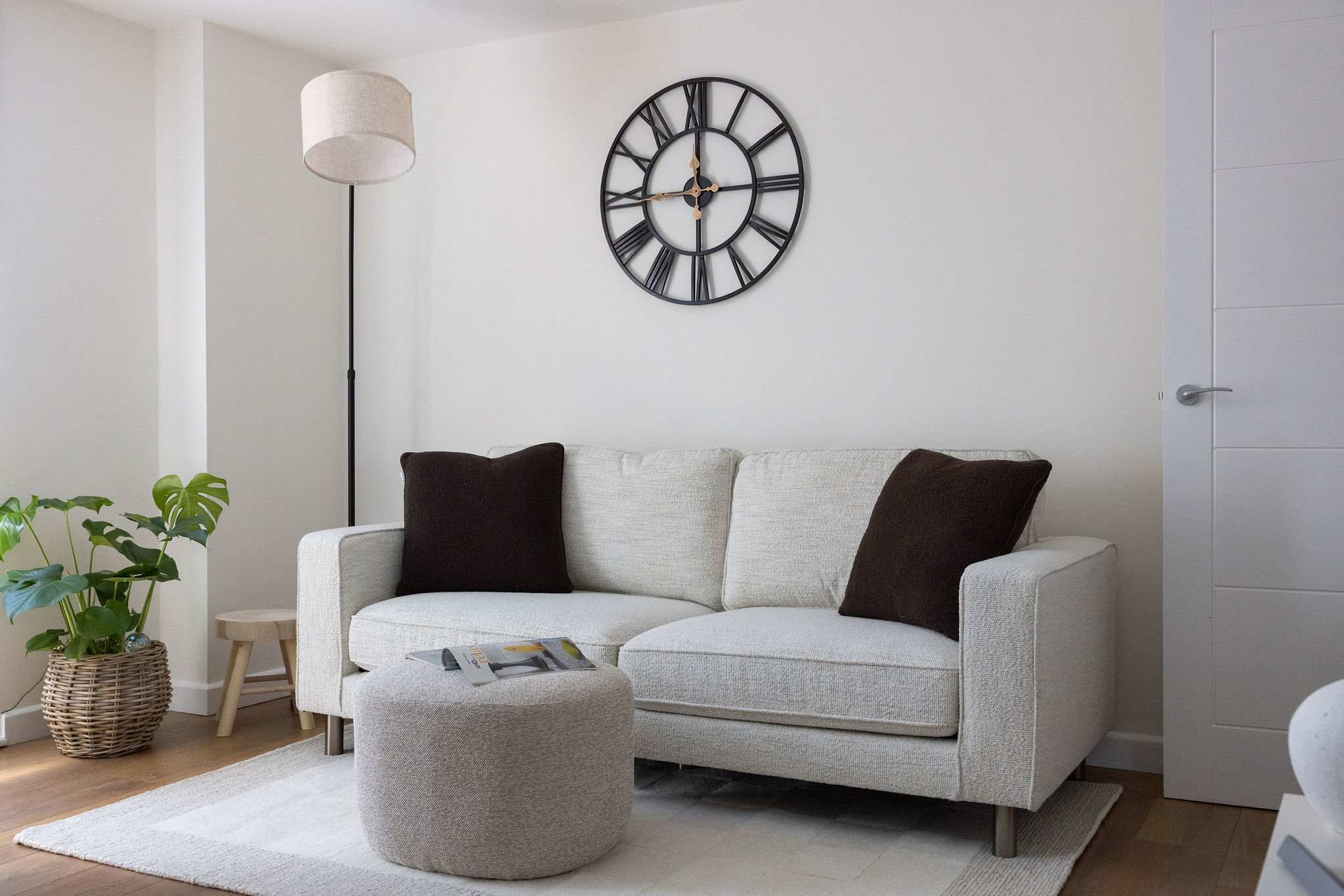 Cosy modern living area offering comfortable seating for a relaxing family getaway or city break.