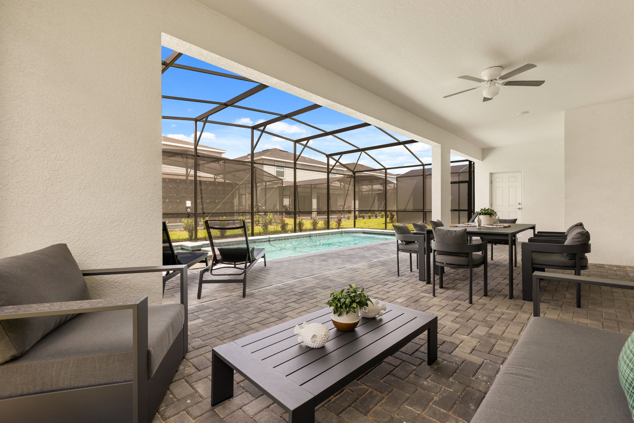 Relax on the stylish patio with a private pool, perfect for entertaining or unwinding in a serene setting.