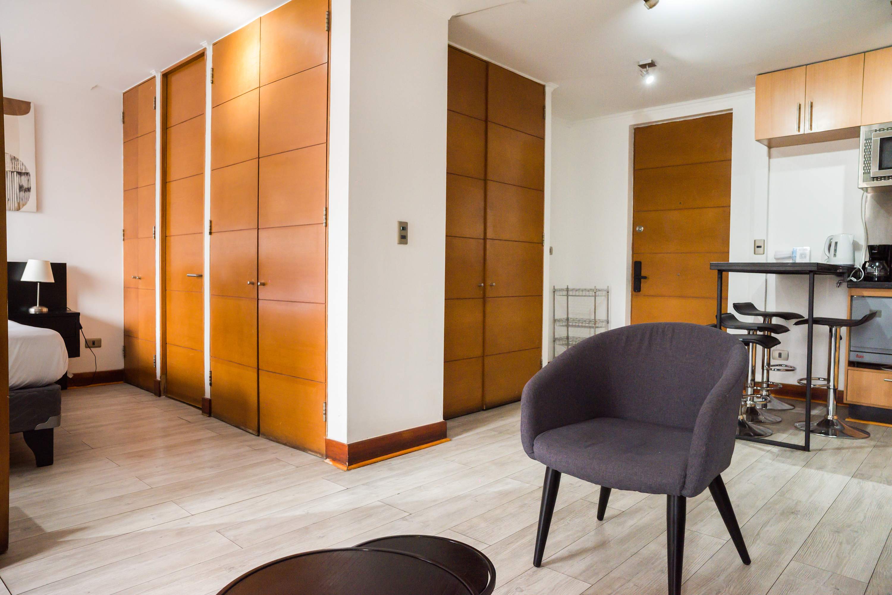 Cozy living area with modern amenities and ample storage, perfect for a comfortable stay.