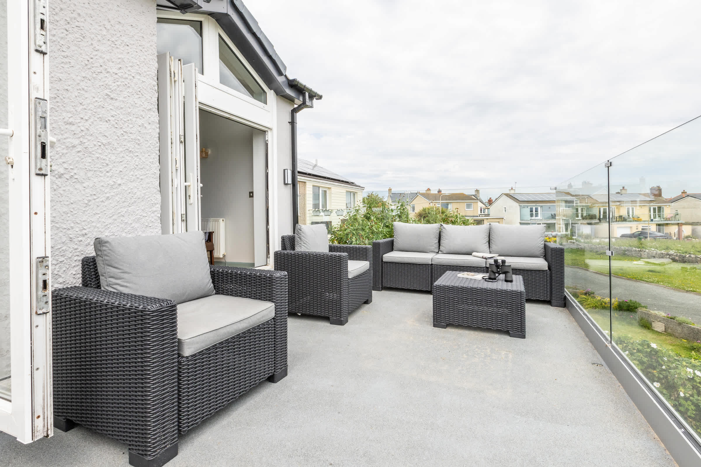 uliette balcony off the master bedroom with panoramic views of the lake and sea, four-bedroom holiday home in Rhosneigr, Anglesey
